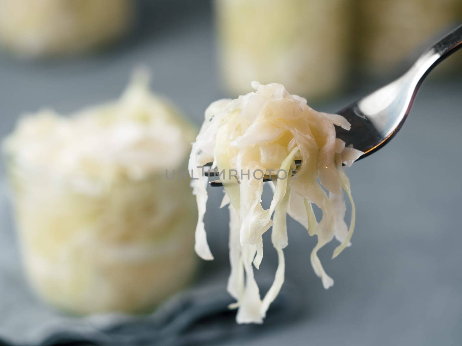 Sauerkraut on fork, copy space by fascinadora