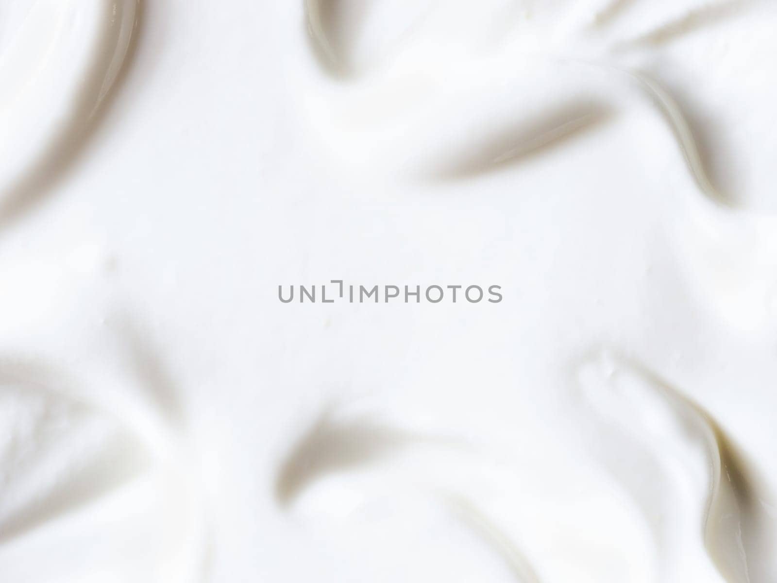 greek yogurt or sour cream texture close up with copy space. Top view or flat lay