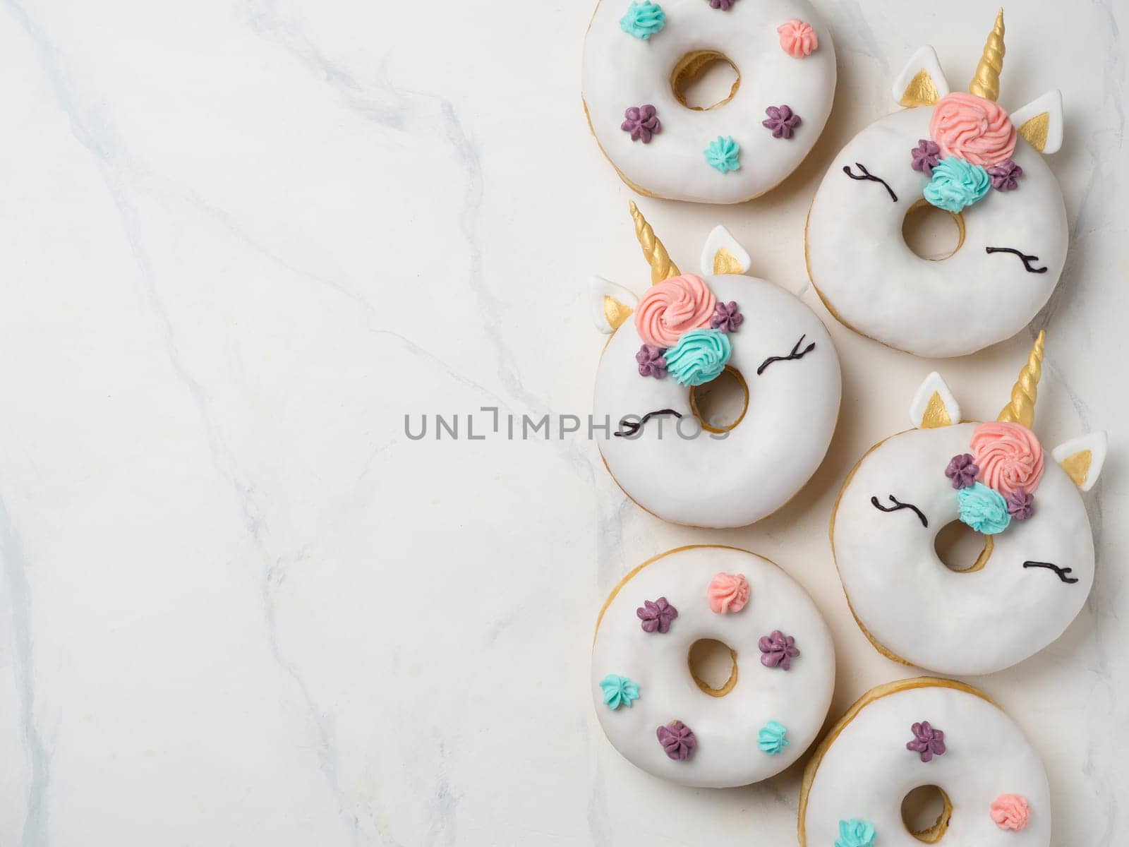 Unicorn donuts with copy space by fascinadora