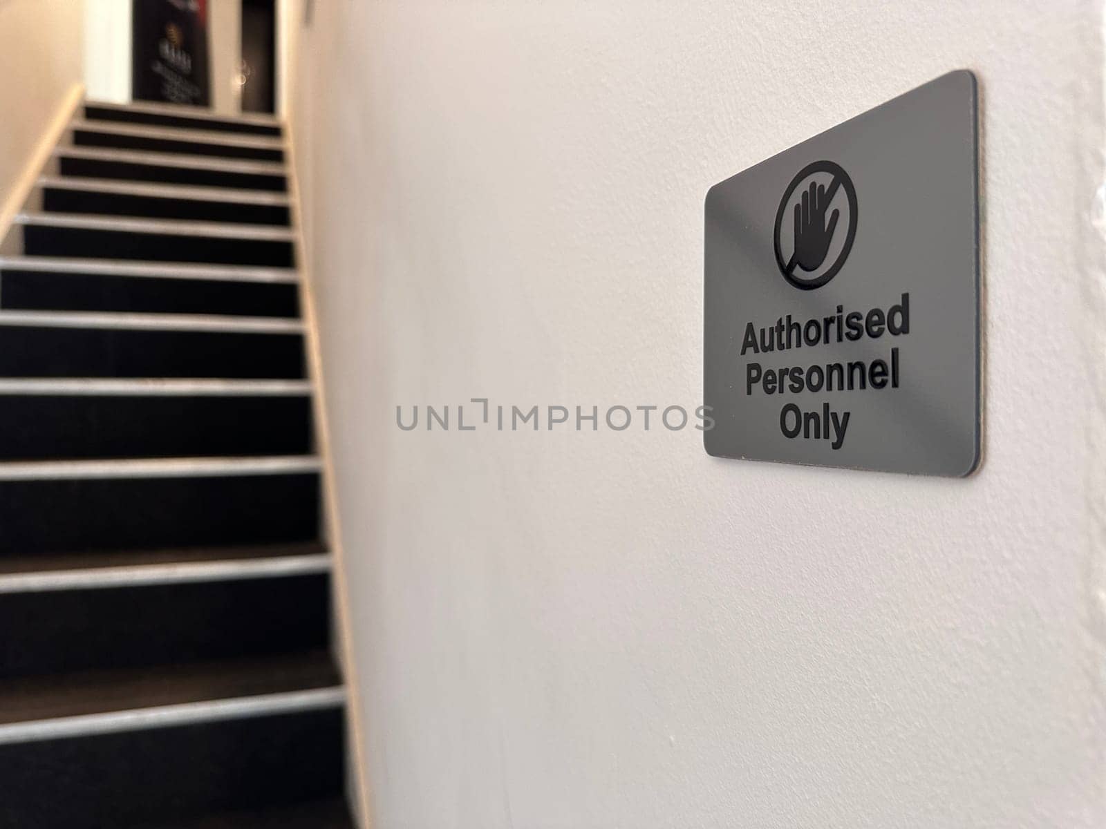 Authorised personnel only sign on the wall