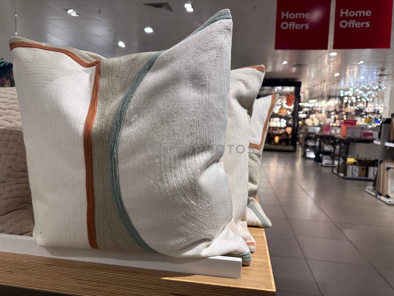 Cushions sold at homeware store by MAD_Production
