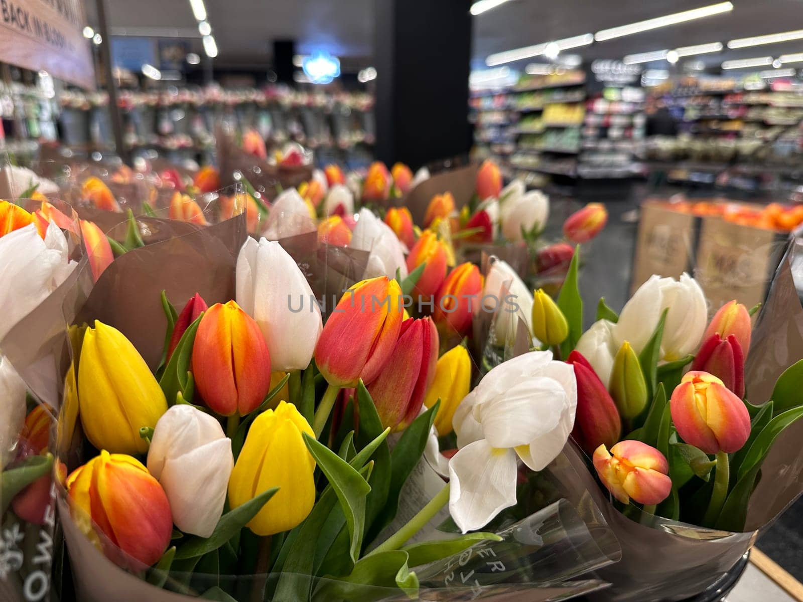Beautiful tulips flower arrangements at florist store
