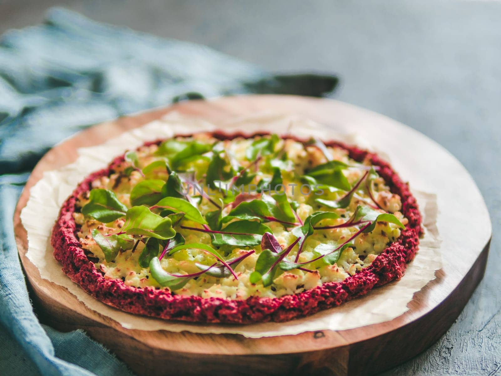 beetroot pizza crust with fresh mangold leaves by fascinadora