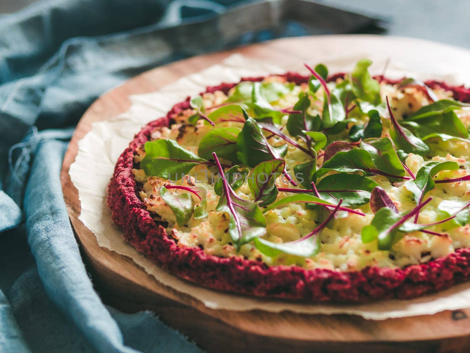 beetroot pizza crust with fresh mangold leaves by fascinadora