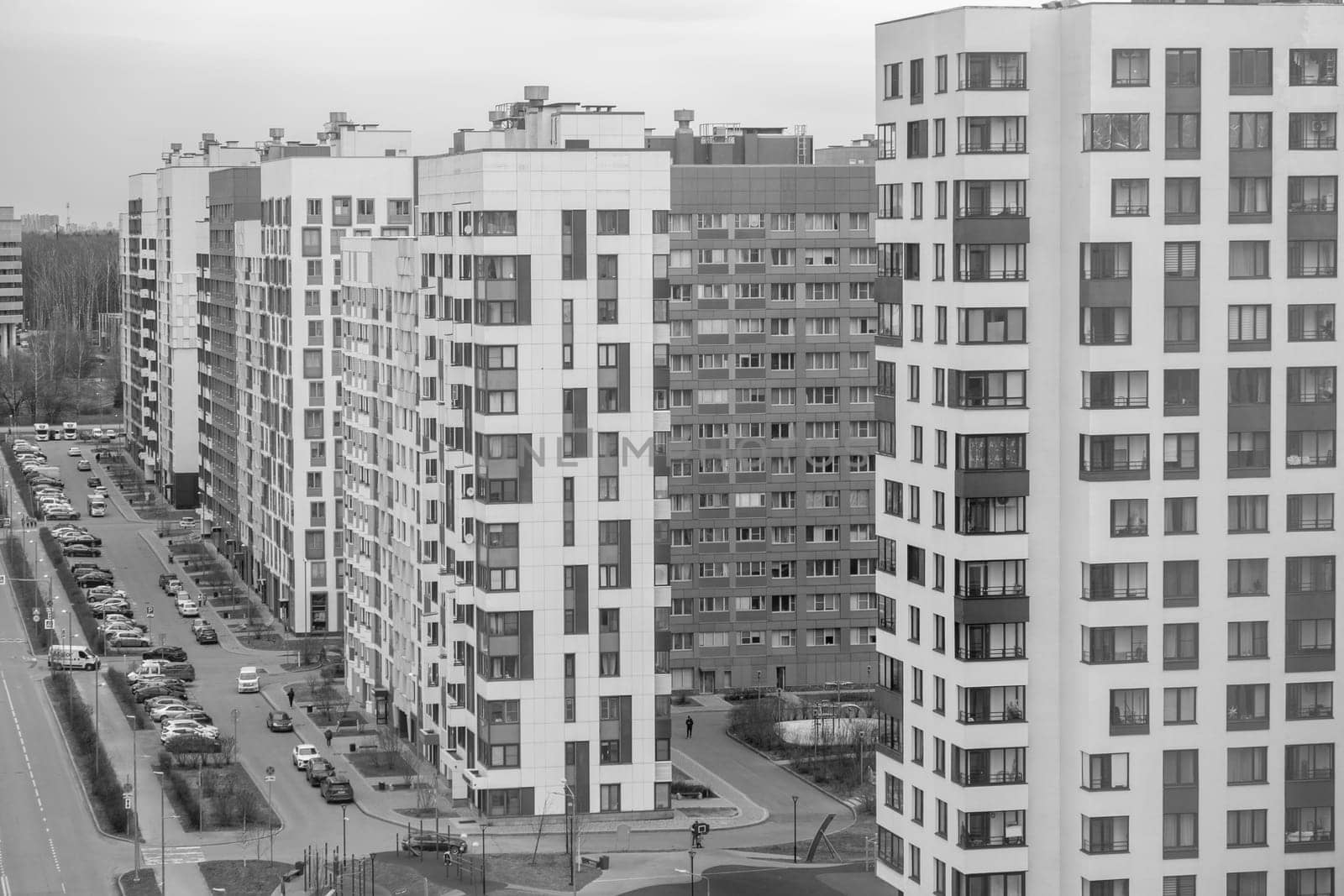 April 8, 2024, Moscow, Russia. New apartment buildings with windows and balconies. Modern european complex of apartment buildings. And outdoor facilities. Mixed media