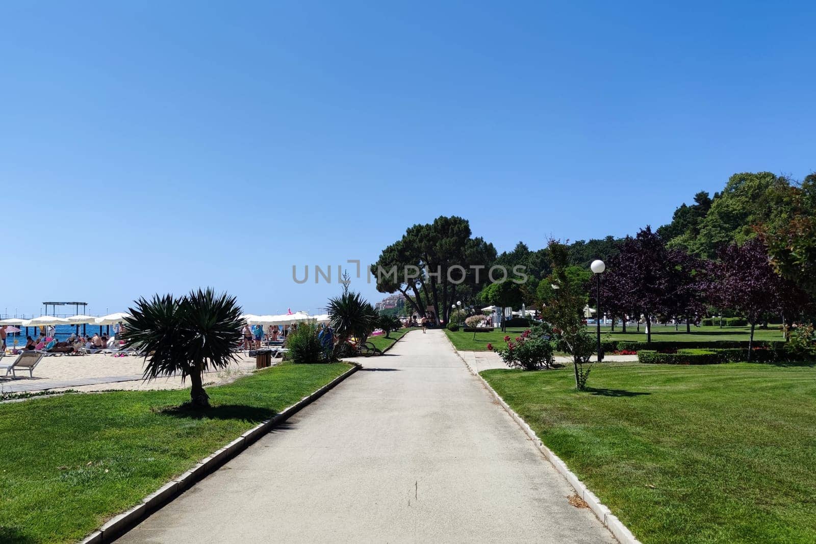 Varna, Bulgaria - June 24, 2023: sunny promenade at the Black Sea resort of Golden Sands