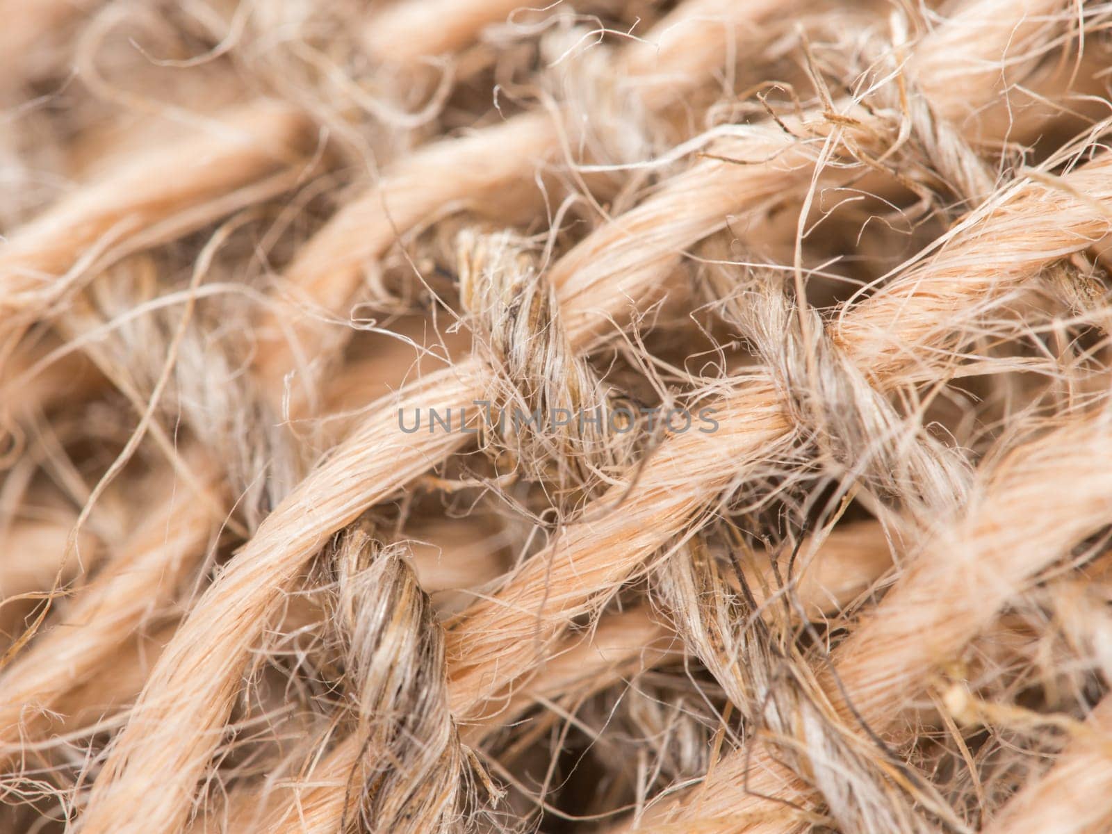 Skein of jute twine on sacking. Clew of natural rope. Close up