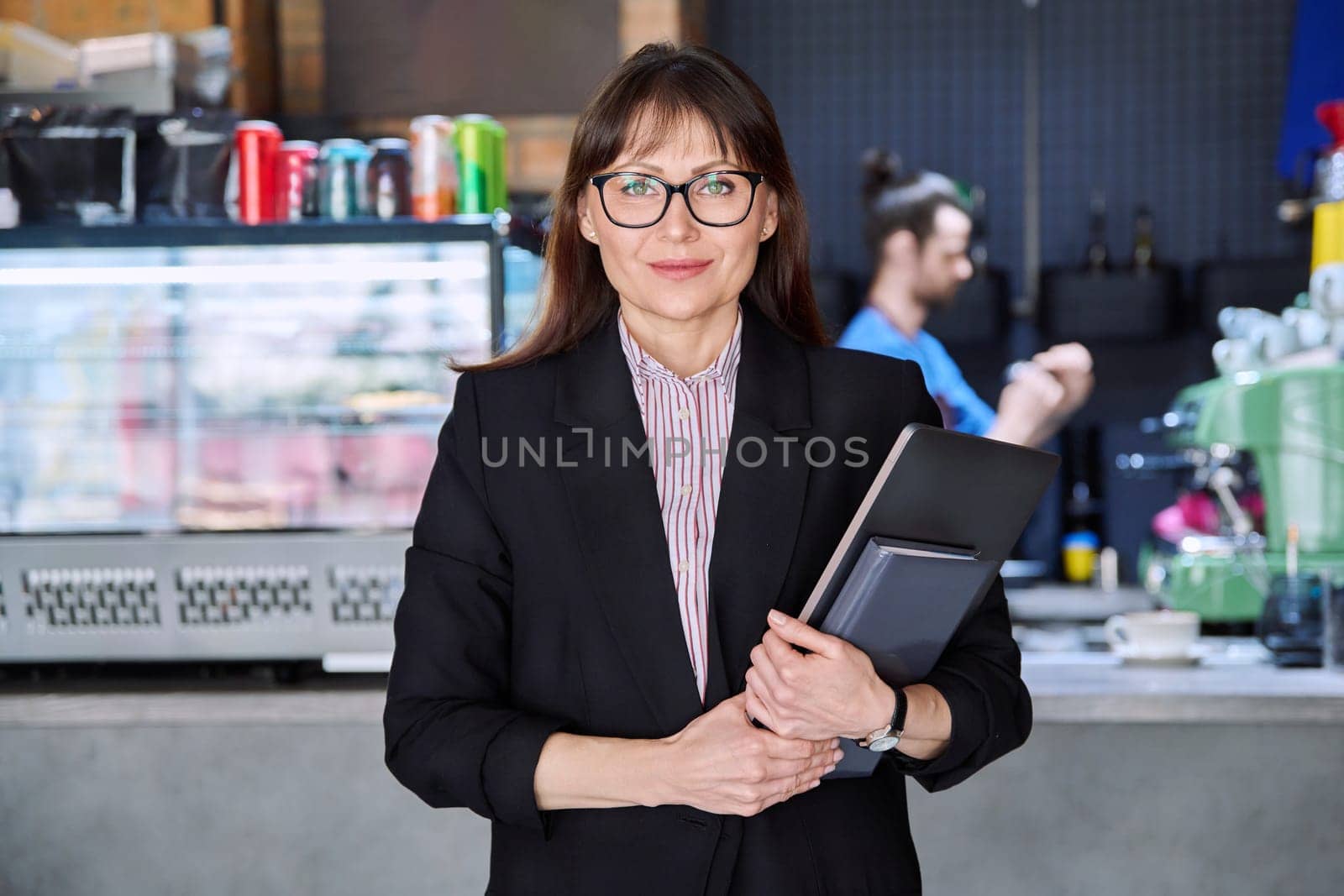 Portrait of business woman, accountant, lawyer, coffee shop cafeteria restaurant owner by VH-studio