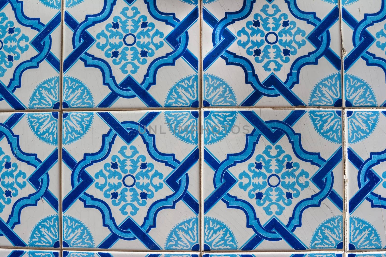 Old tiles of Portugal, detail of a classic ceramic tiles azulejo, art of Portugal