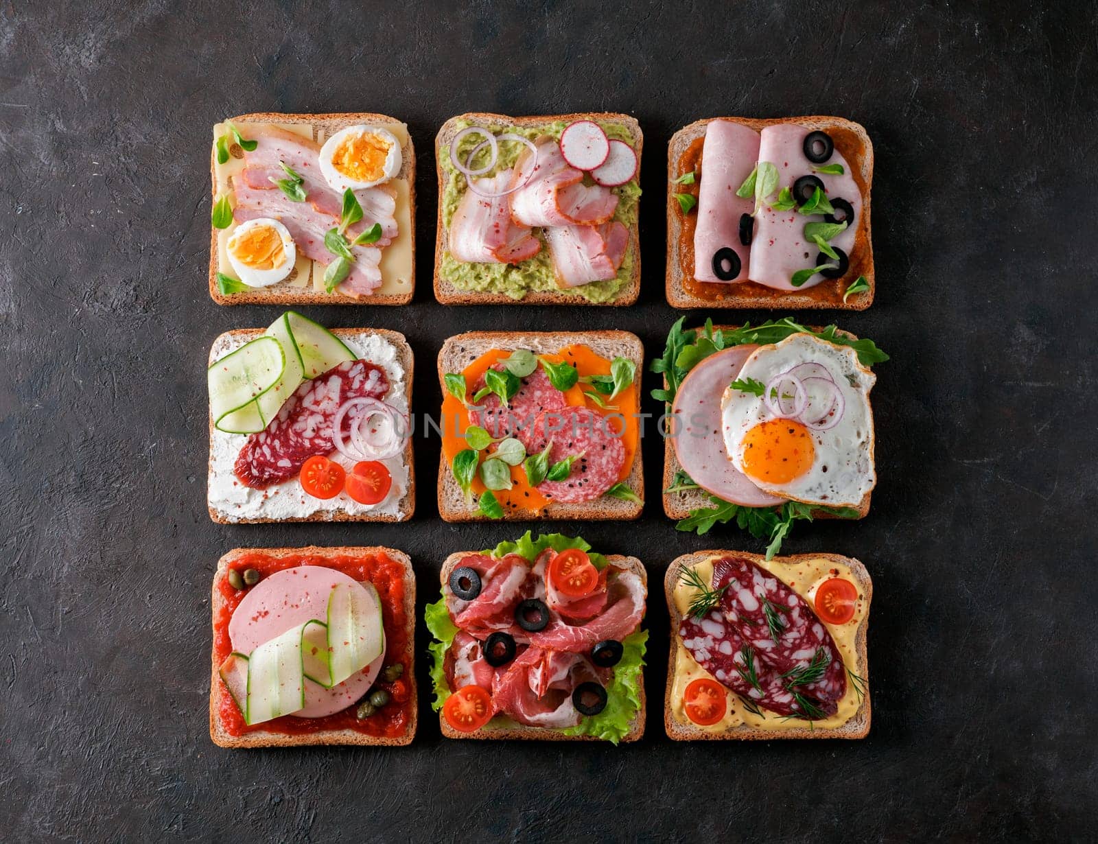 open sandwiches with different meat, copy space by fascinadora