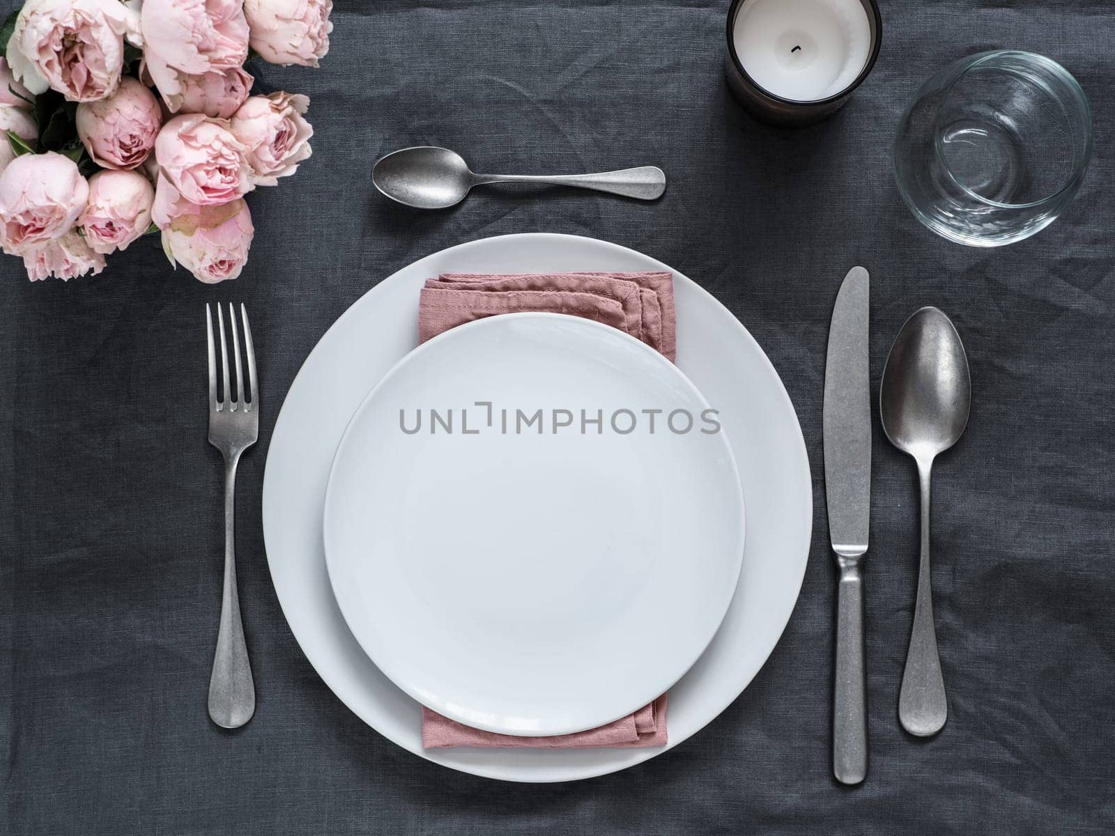 Beautiful table setting on gray linen tablecloth by fascinadora