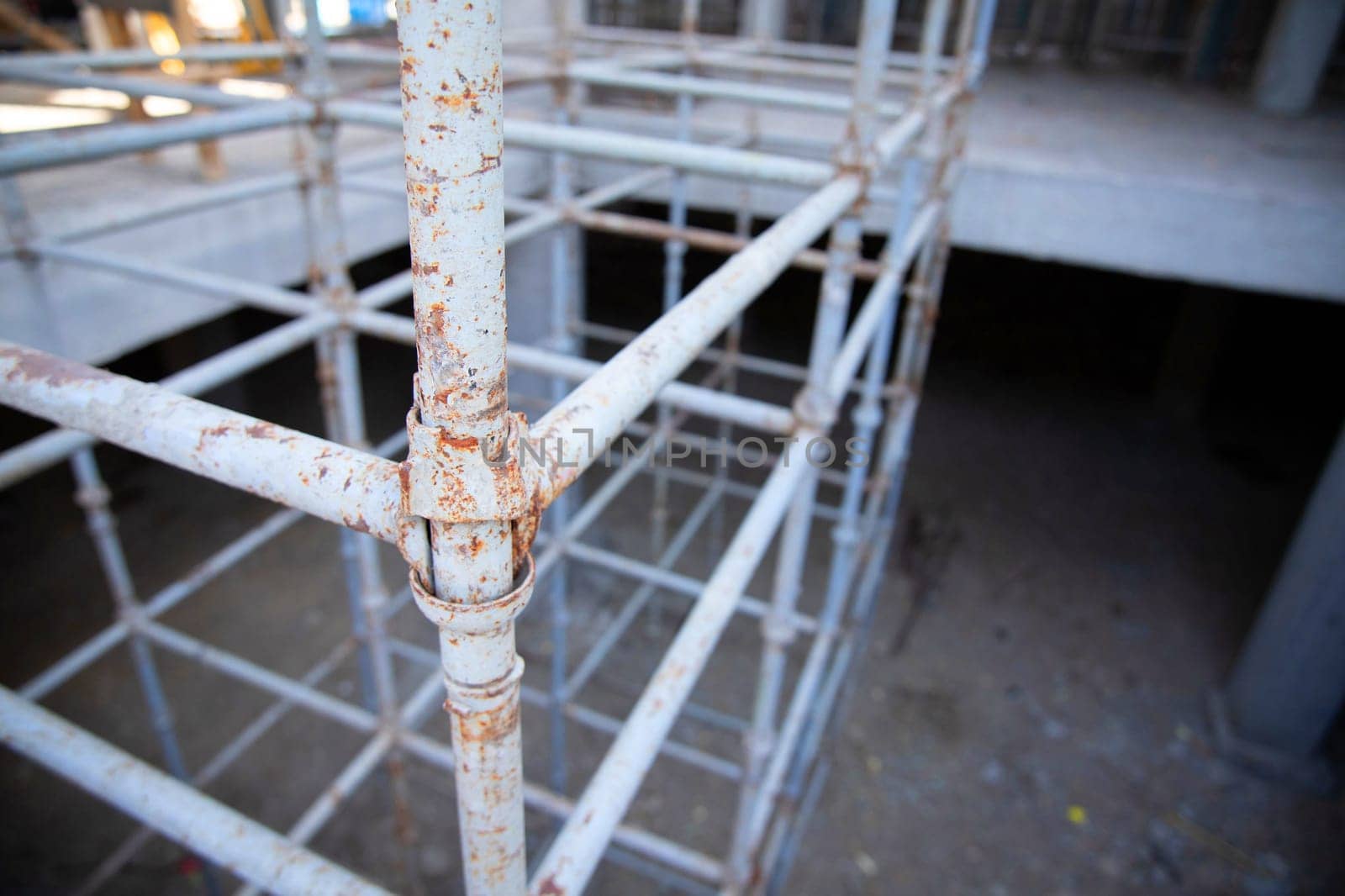 Scaffolding on a construction site, selective soft focus by Rom4ek