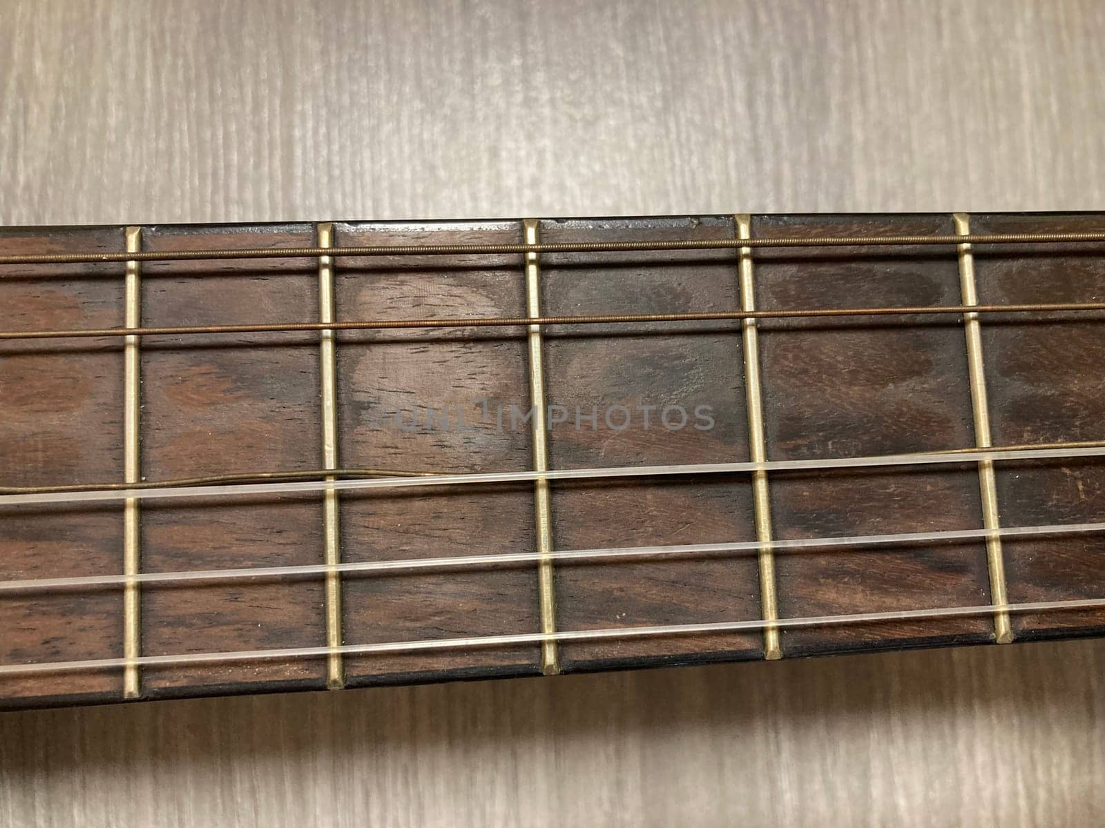Acoustic guitar and its elements for the playing