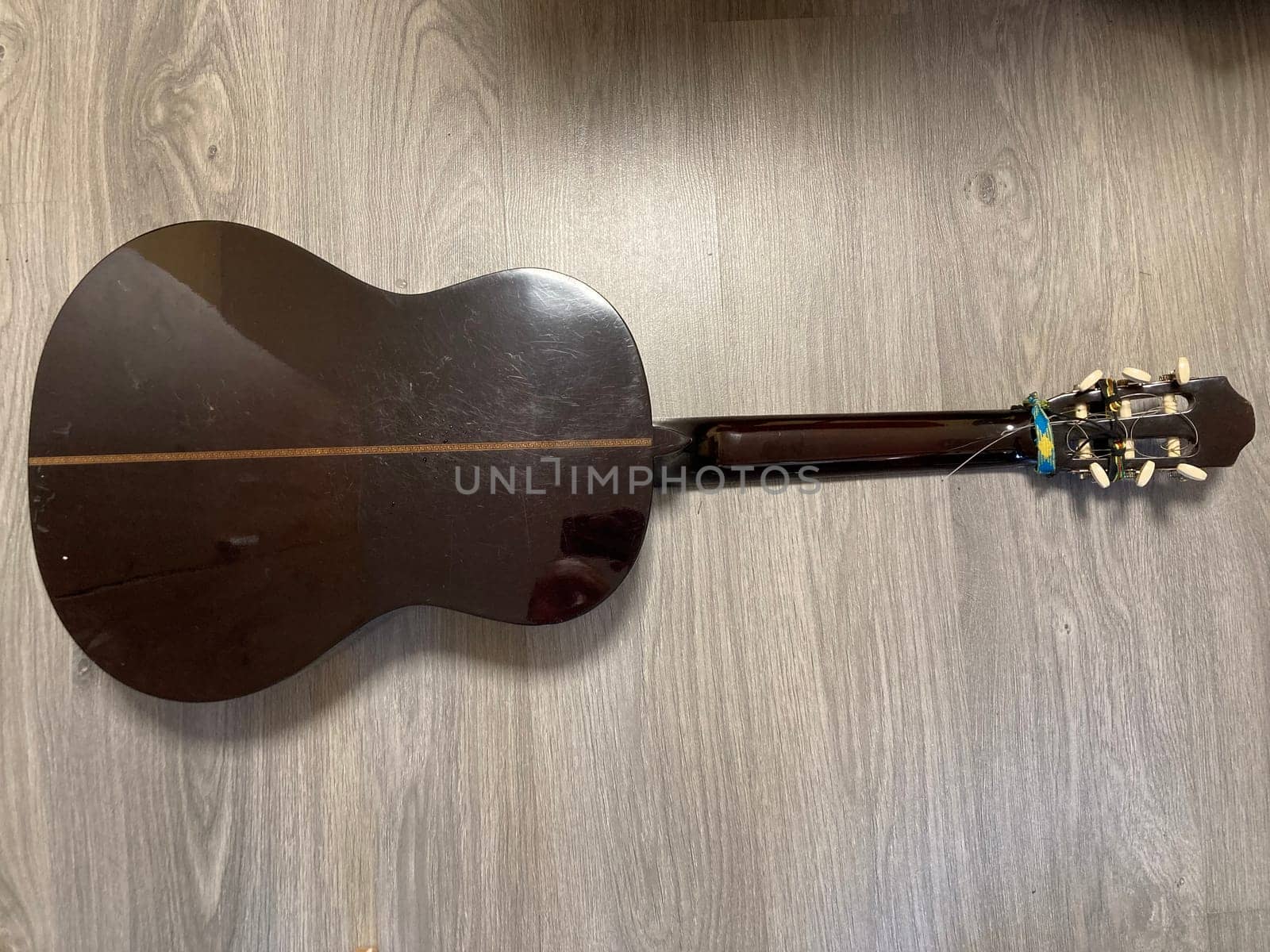 Acoustic guitar and its elements for the playing