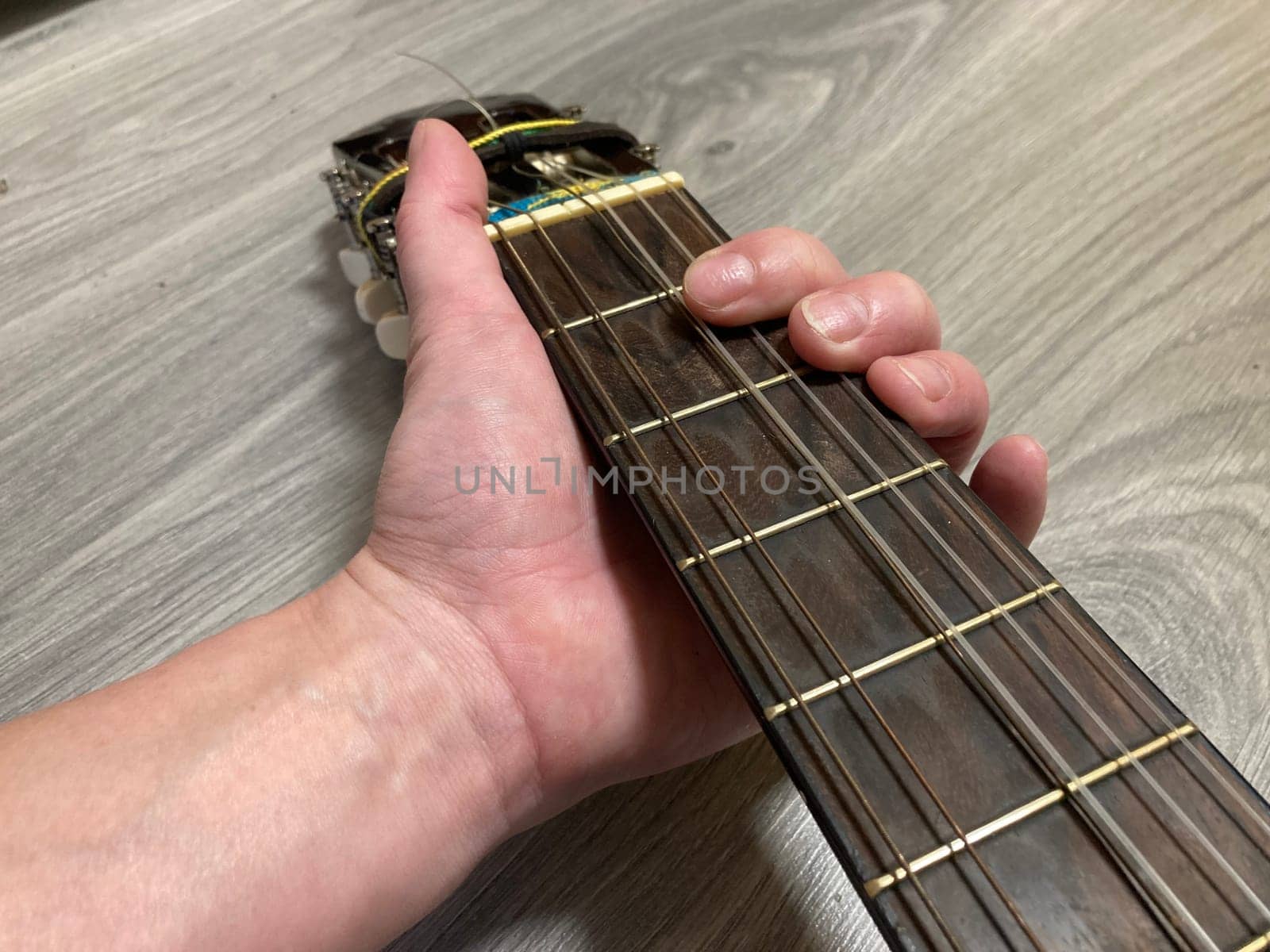 Acoustic guitar and its elements for the playing