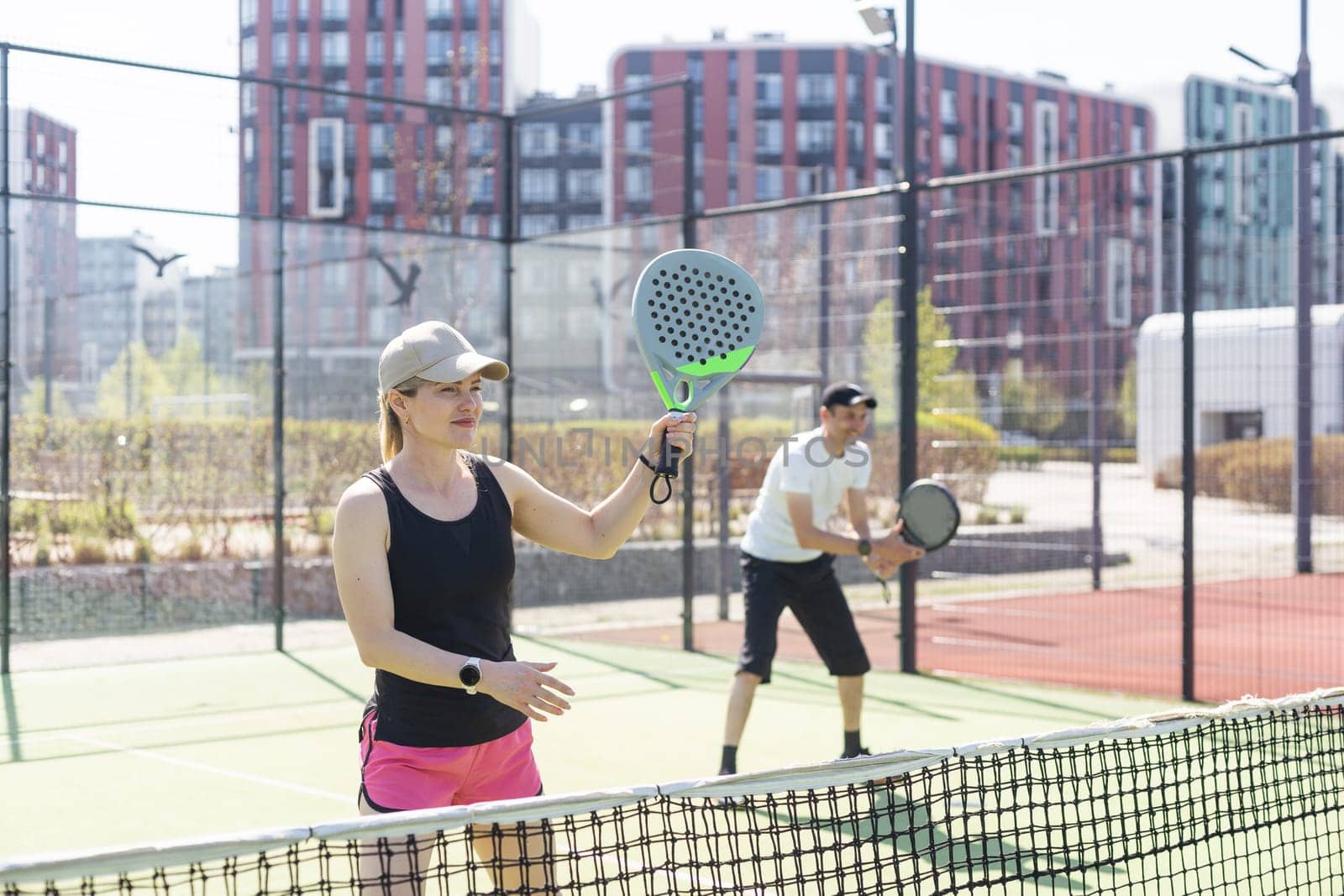 paddle tennis couple players ready for class by Andelov13