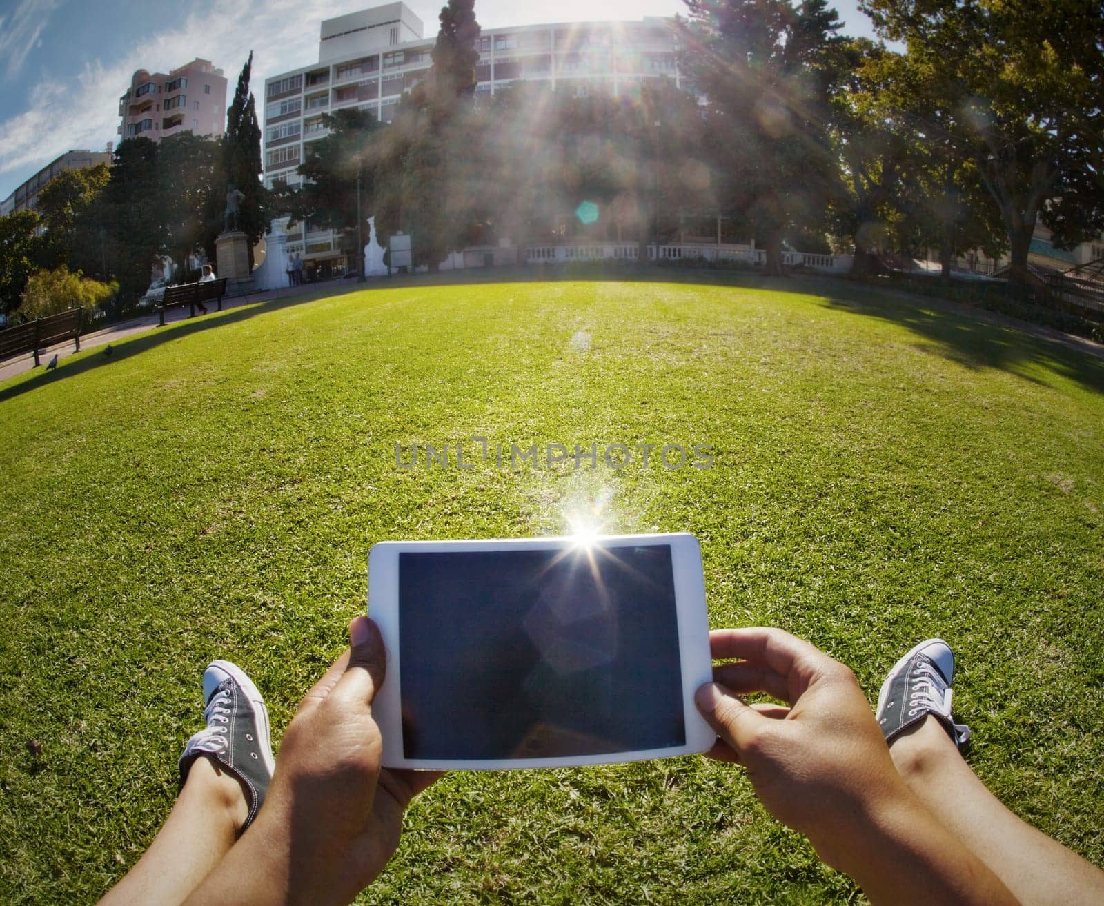 Tablet, screen and online outdoor with hands to scroll on web, reading ebook or check social media. Person, pov and watch video on mobile app with tech in park, garden or student on campus at college by YuriArcurs
