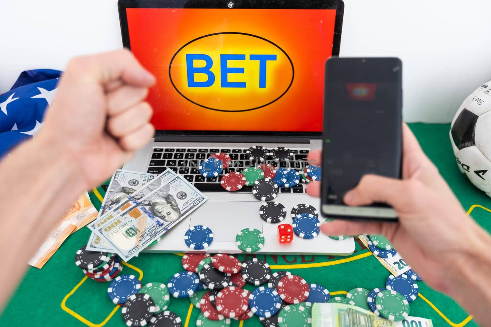 Gambling online casino Internet betting concept green screen. smartphone with poker chips, dice. Jackpot, casino chips. High quality photo