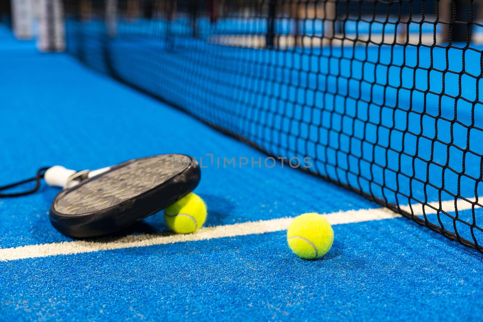 Paddle objects on blue turf. High quality photo