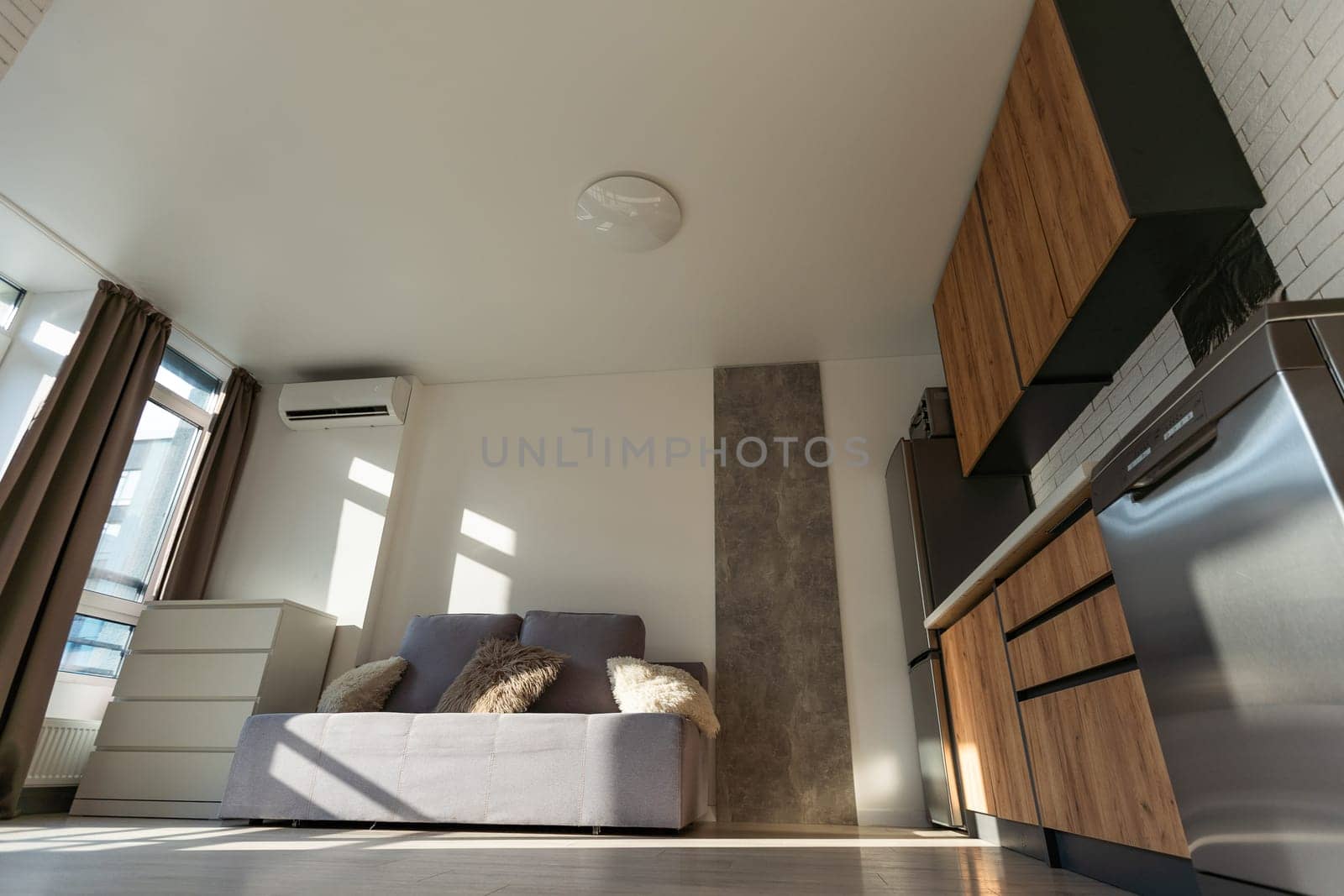 Interior of modern luxury apartment, empty attic, kitchen open space