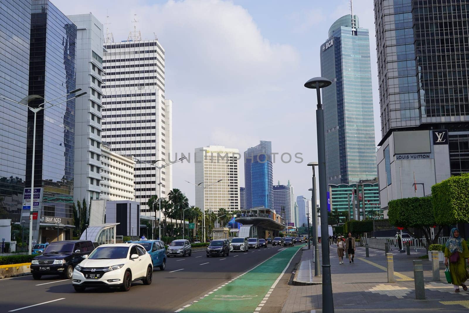 The atmosphere of Jakarta city around the HI Roundabout one day after Eid al-Fitr 2024 by cr8image