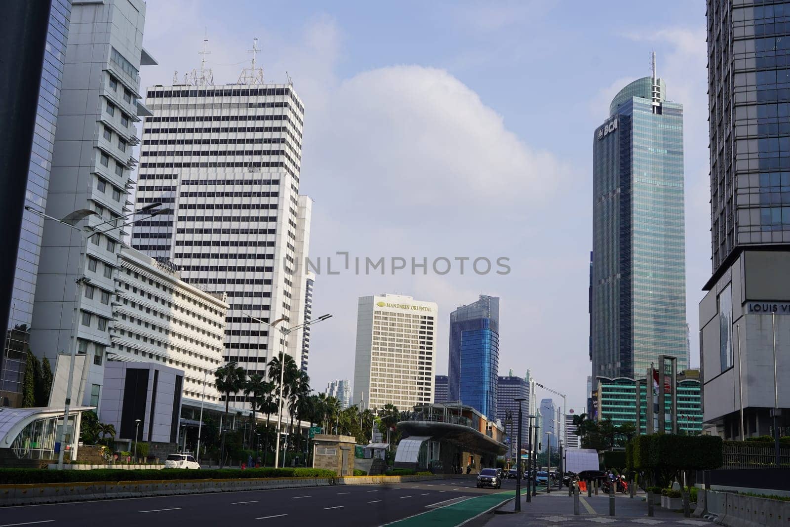 The atmosphere of Jakarta city around the HI Roundabout one day after Eid al-Fitr 2024 by cr8image
