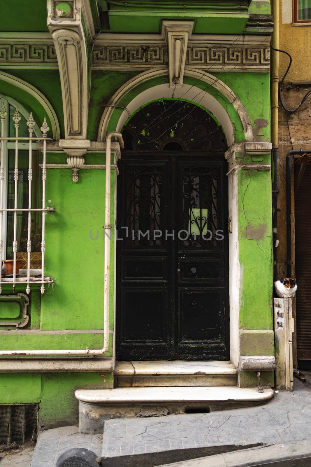 Old wooden entrance door of house in Istanbul, Turkey