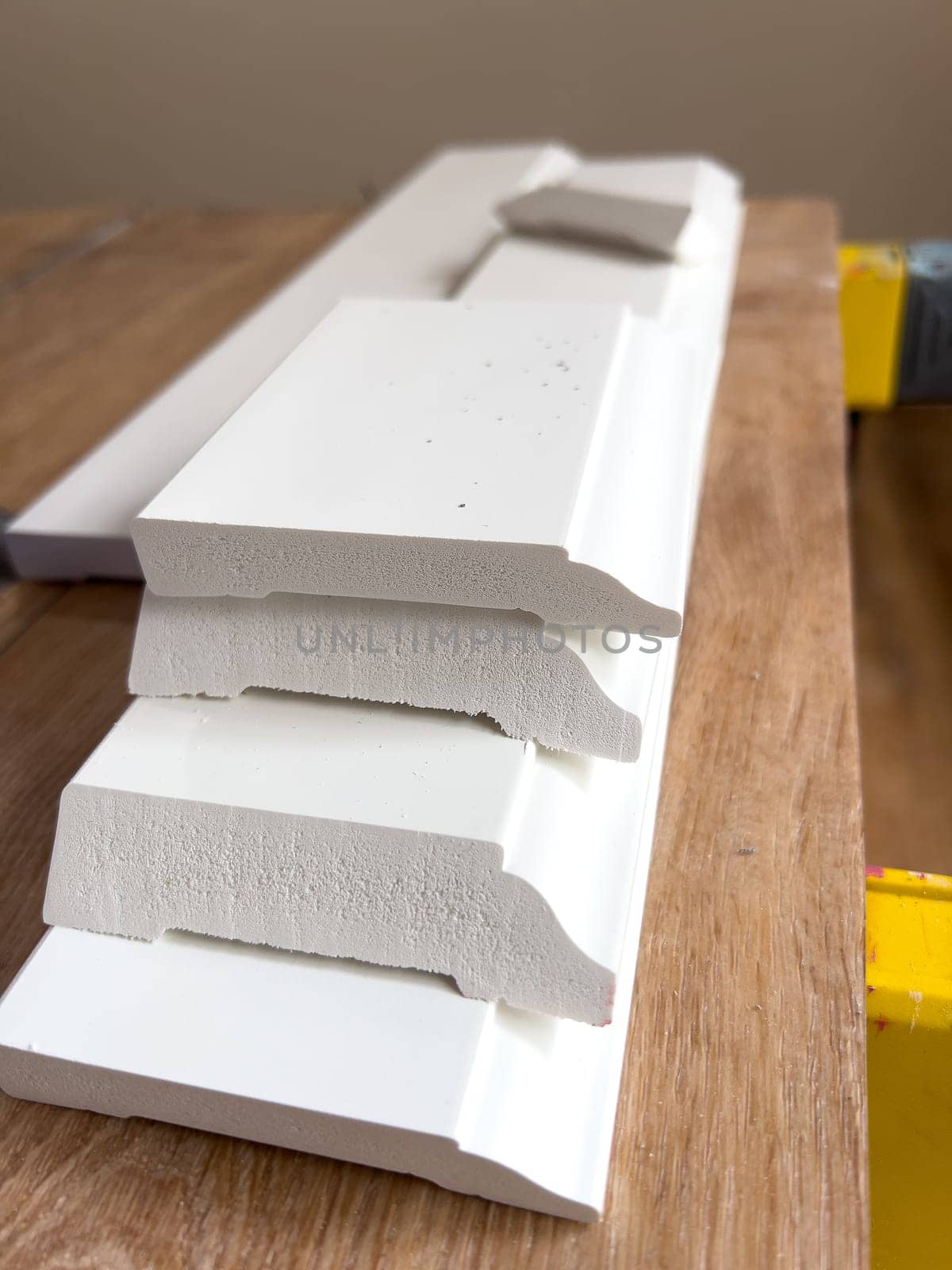 Installing Vinyl Baseboards in a Modern Home Renovation Project by arinahabich