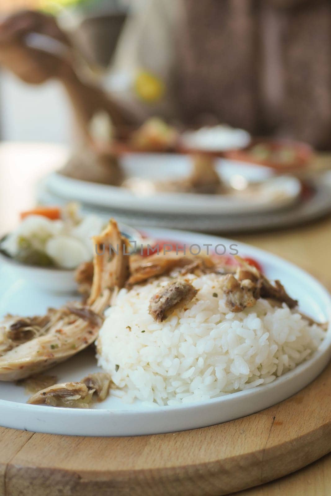 Boiled chicken, steamed rice, pink plate. by towfiq007
