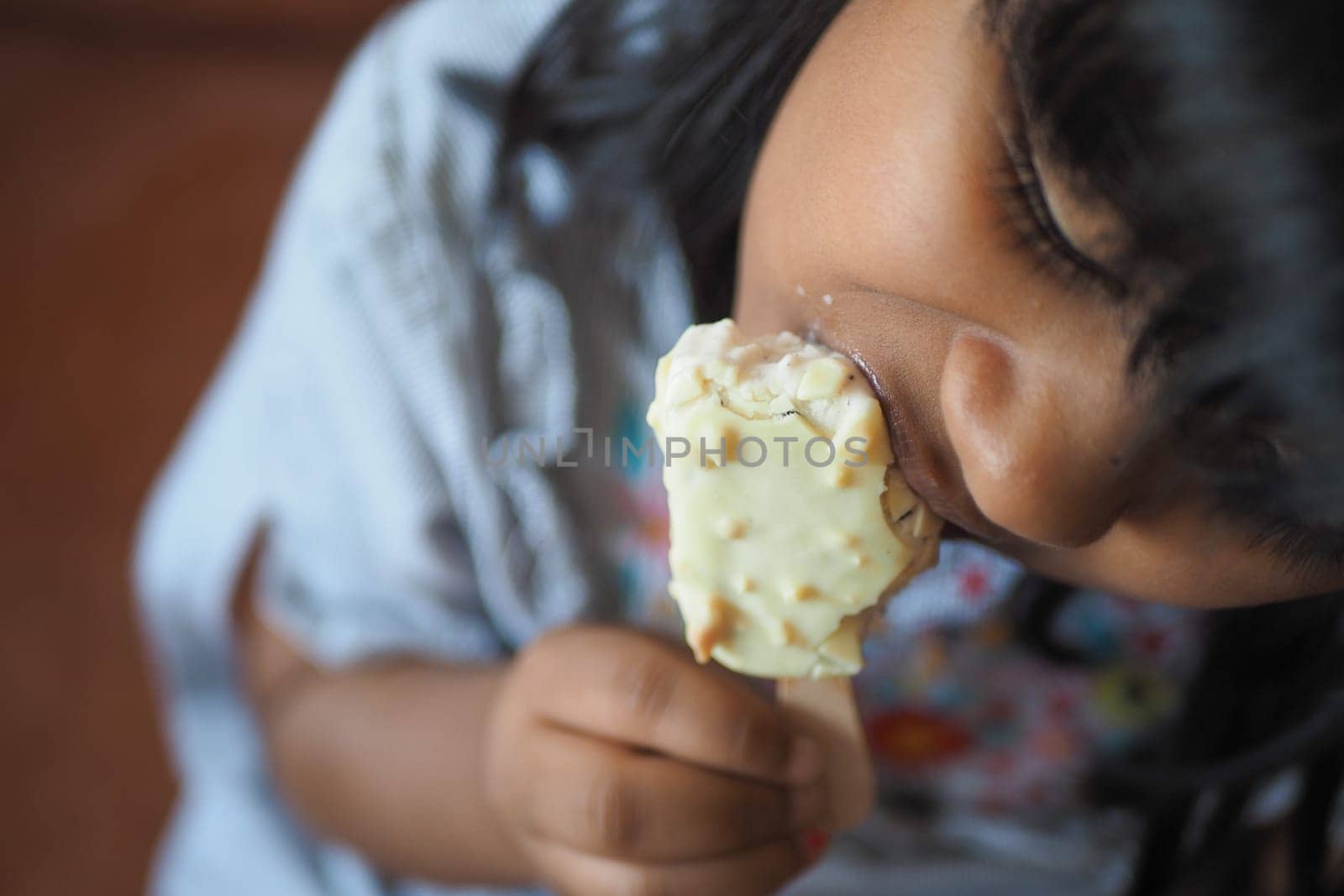 Child Hand Holding Ice Cream by towfiq007