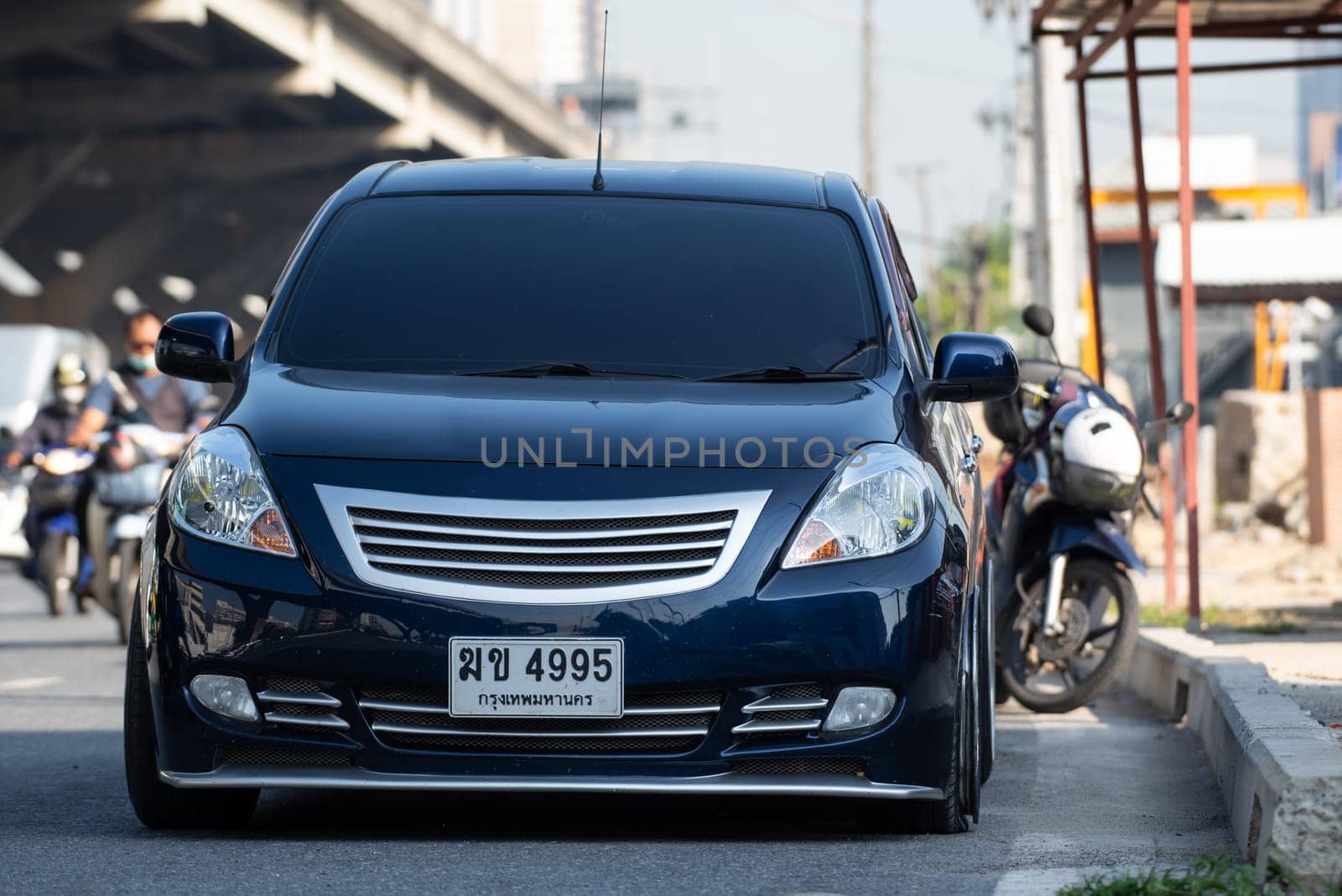 Bangkok, Thailand - November 22, 2022 : Car damaged crash from car accident on the road wait insurance in a city collision in Bangkok Road, accidents are a major problem of traffic in Thailand.