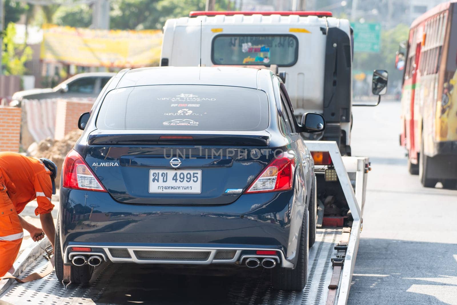 Bangkok, Thailand - November 22, 2022 : Car damaged crash from car accident on the road wait insurance in a city collision in Bangkok Road, accidents are a major problem of traffic in Thailand.