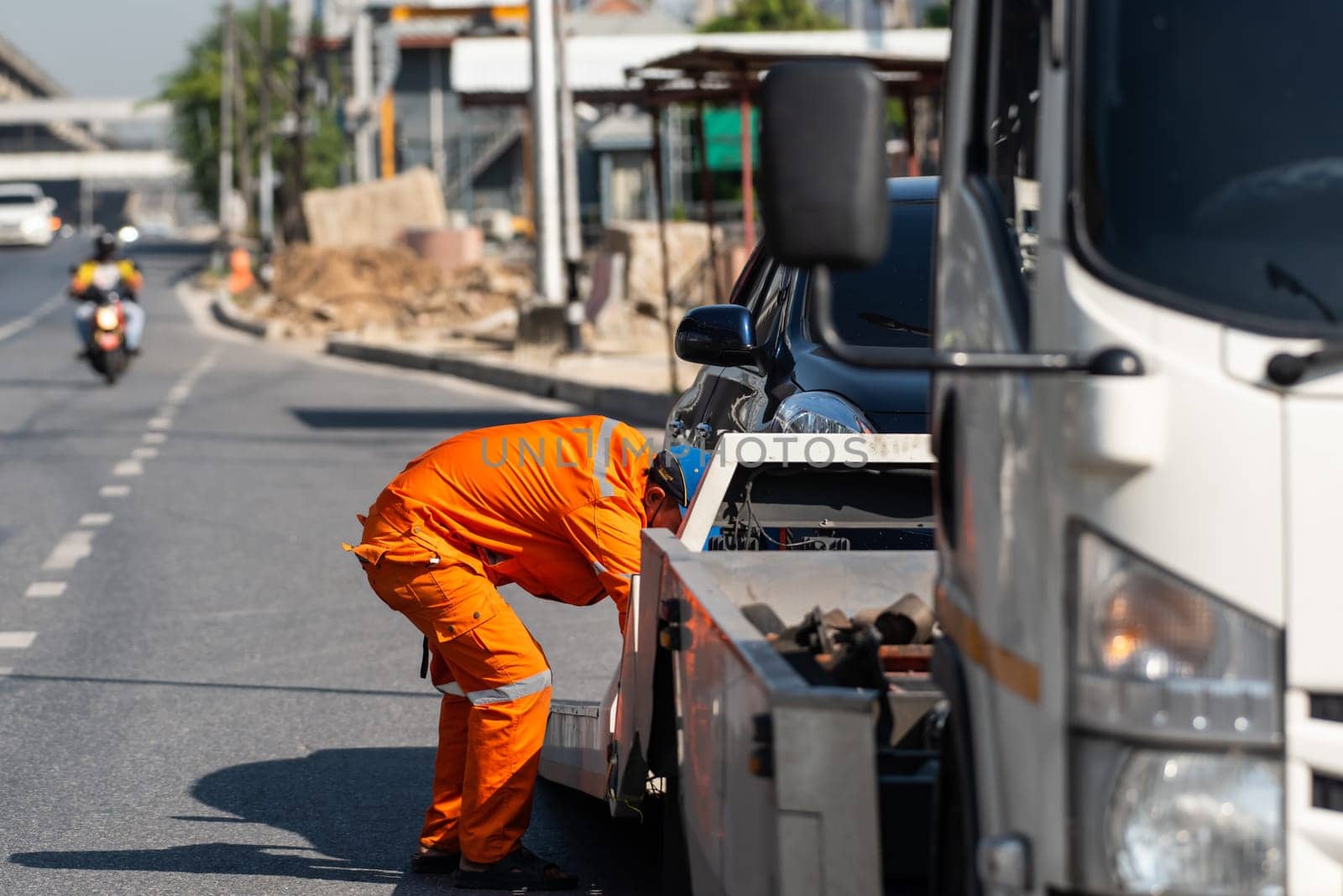 Bangkok, Thailand - November 22, 2022 : Car damaged crash from car accident on the road wait insurance in a city collision in Bangkok Road, accidents are a major problem of traffic in Thailand.