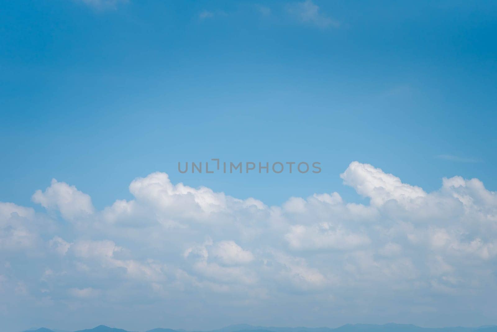 Cloudscape of natural sky with blue sky and white clouds in the sky use for wallpaper background in concept dreamy, heaven or freedom in life