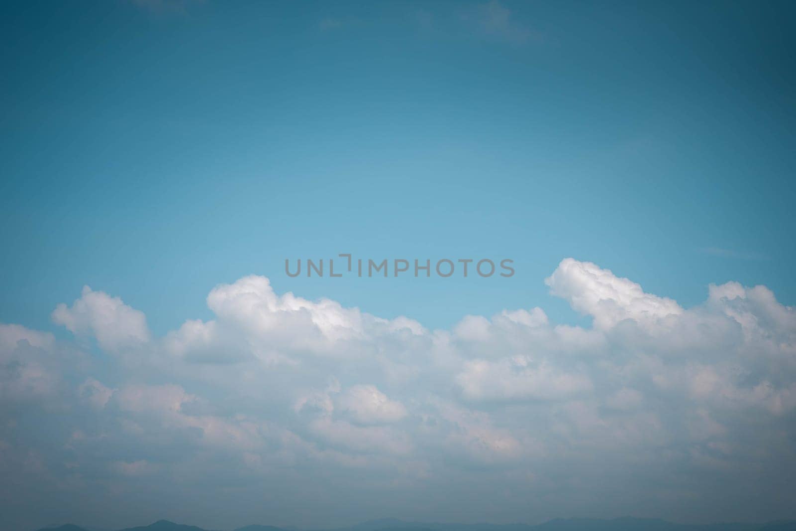 Cloudscape of natural sky with blue sky and white clouds in the sky use for wallpaper background in concept dreamy, heaven or freedom in life