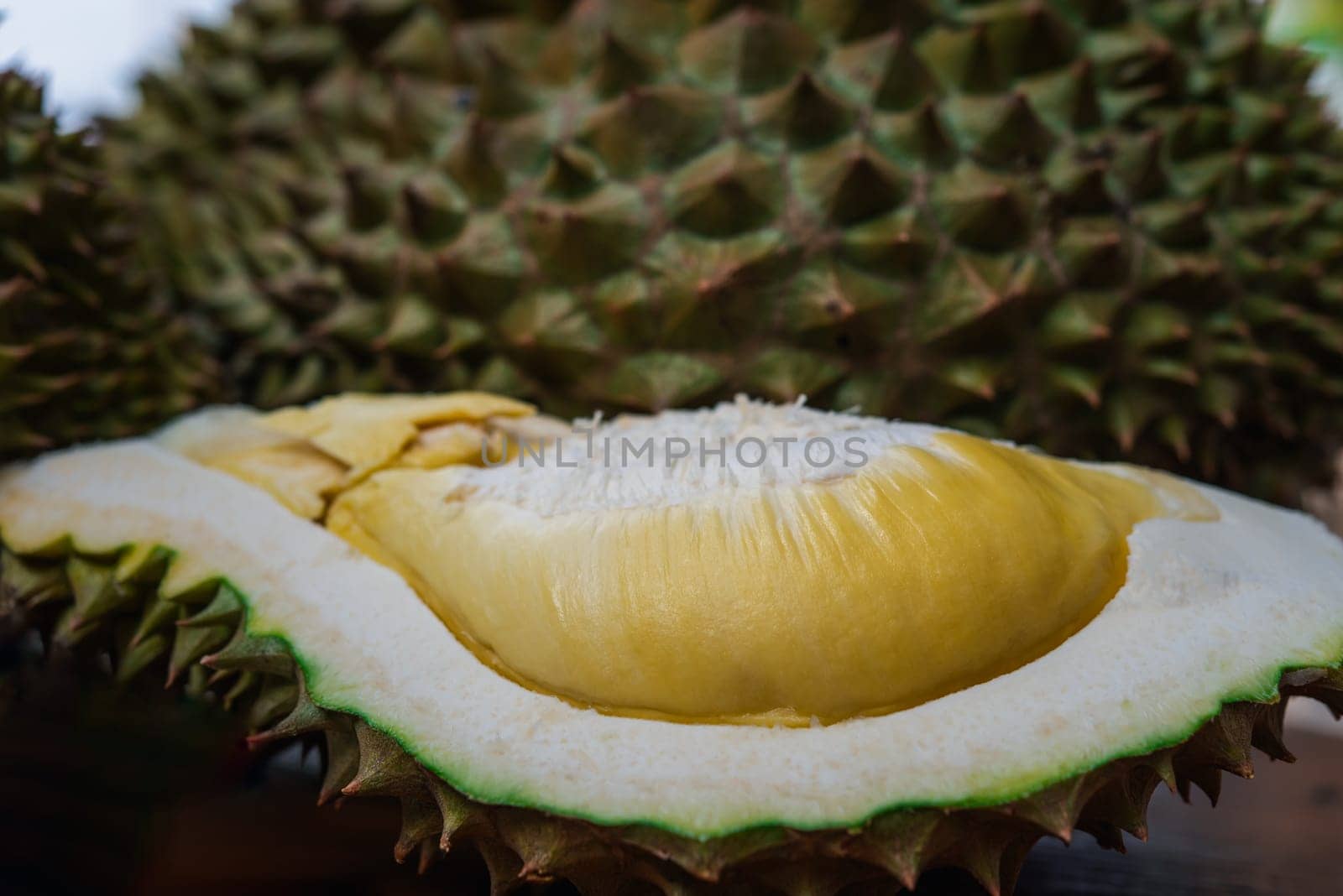 Durian is a king of fruit in Thailand and asia fruit have a spikes shell and sweet can buy at Thai street food and fruit market at agriculture farm