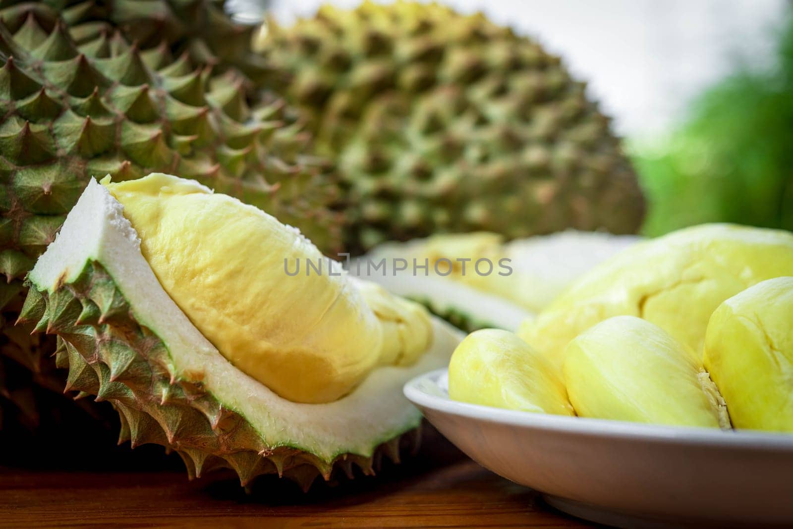 Durian is a king of fruit in Thailand and asia fruit have a spikes shell and sweet can buy at Thai street food and fruit market at agriculture farm