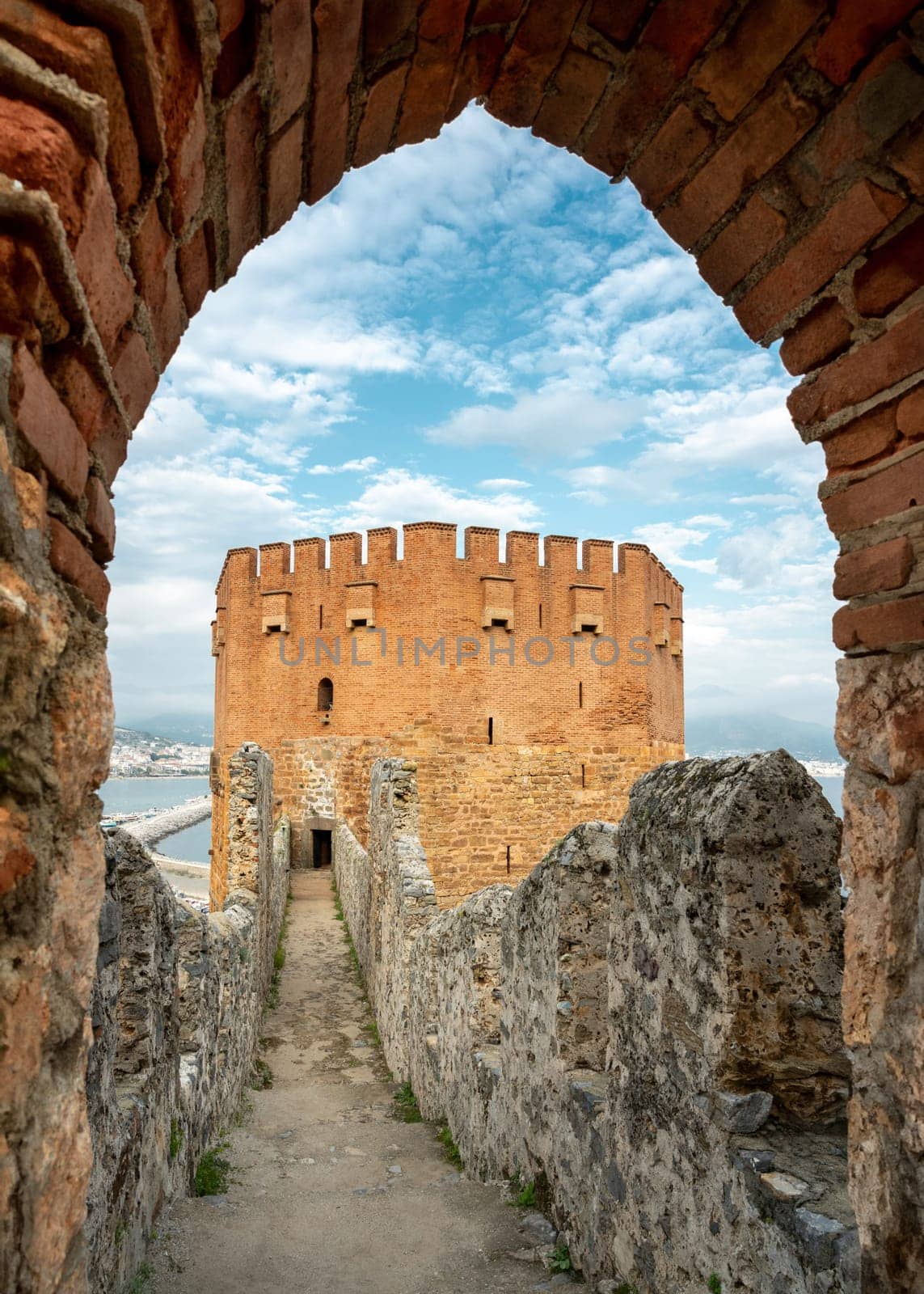 The historical Red Tower in the Alanya district of Antalya, one of the touristic regions of Turkey. Turkish name Kizil Kule by Sonat