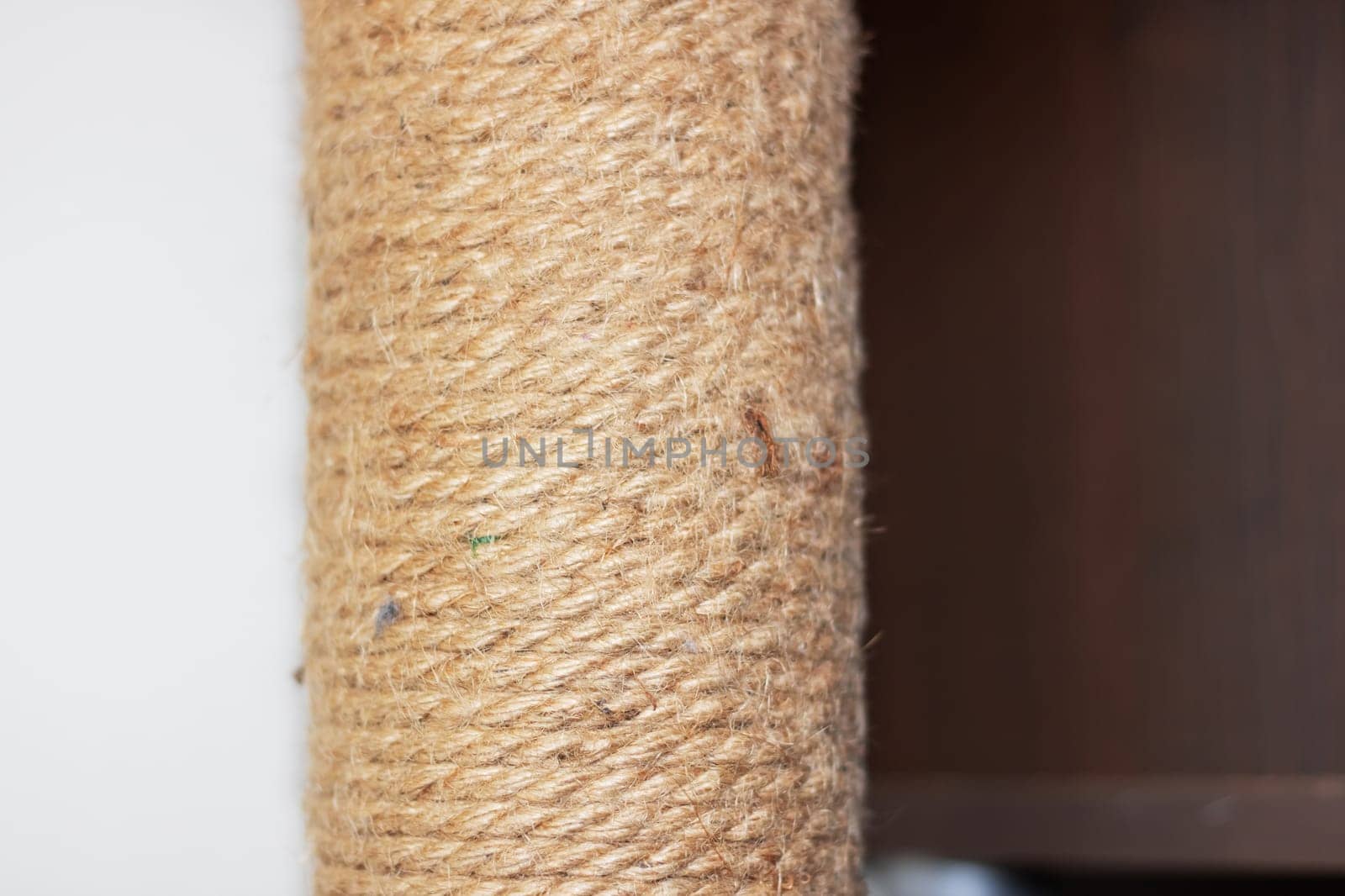 Close up of a wooden cat scratching post crafted with rope by Vera1703