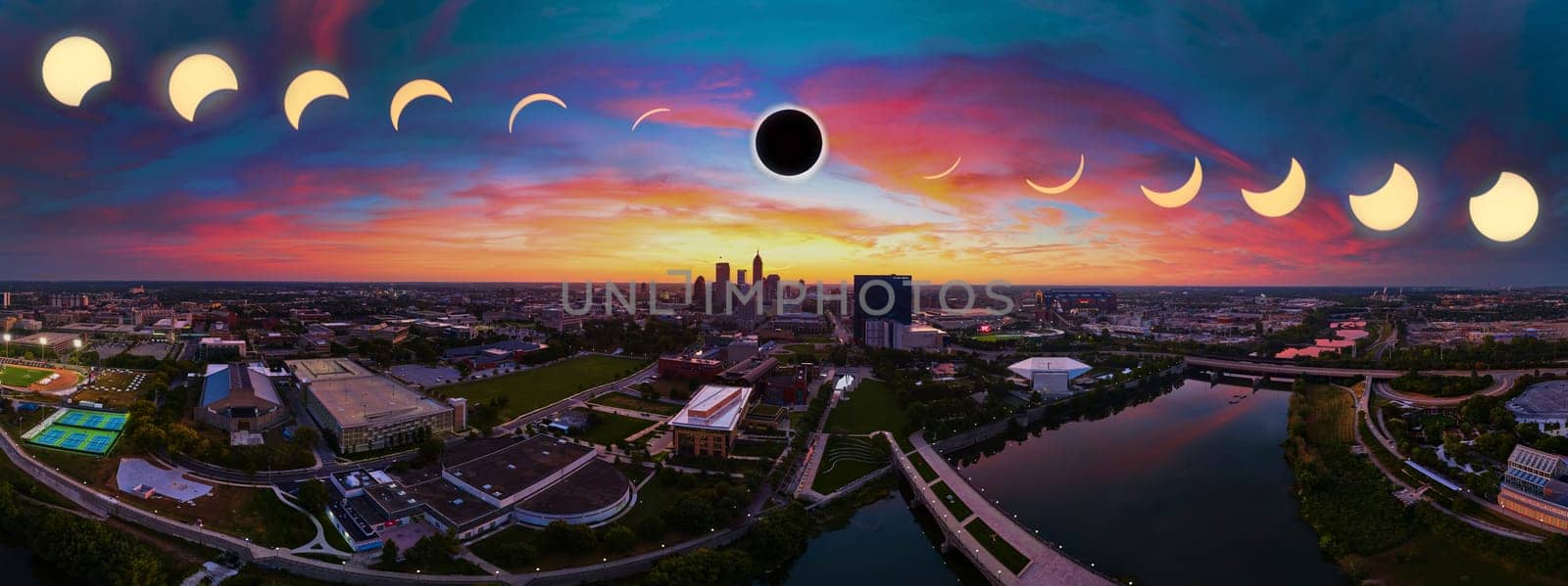Solar Eclipse Over Indianapolis Skyline - Rare Aerial Panorama Capturing Nature's Majestic Dance with Urban Sprawl, April 2024.