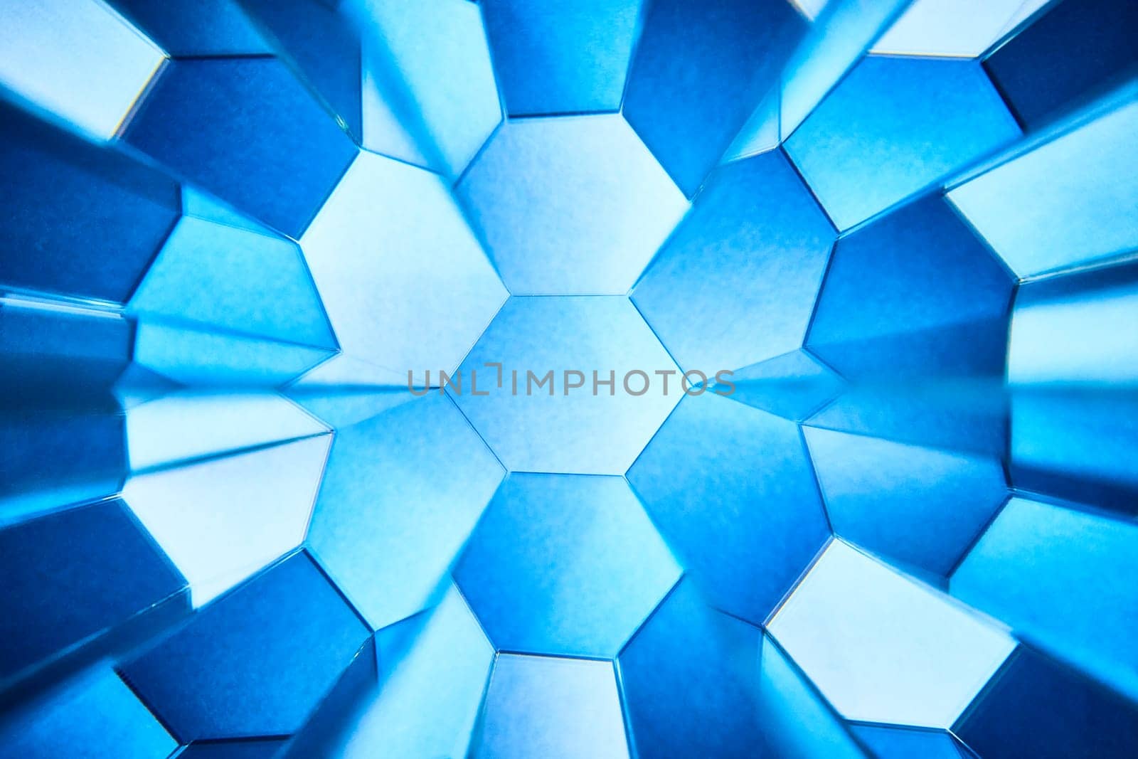 Abstract Kaleidoscopic View of Hexagonal Geometric Pattern in Cool Blue Shades, Perfect for Design and Technology Concepts