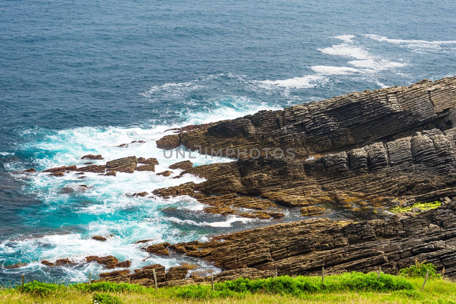 rocky shore of the Atlantic coast in Spain, Basque Country. by paca-waca