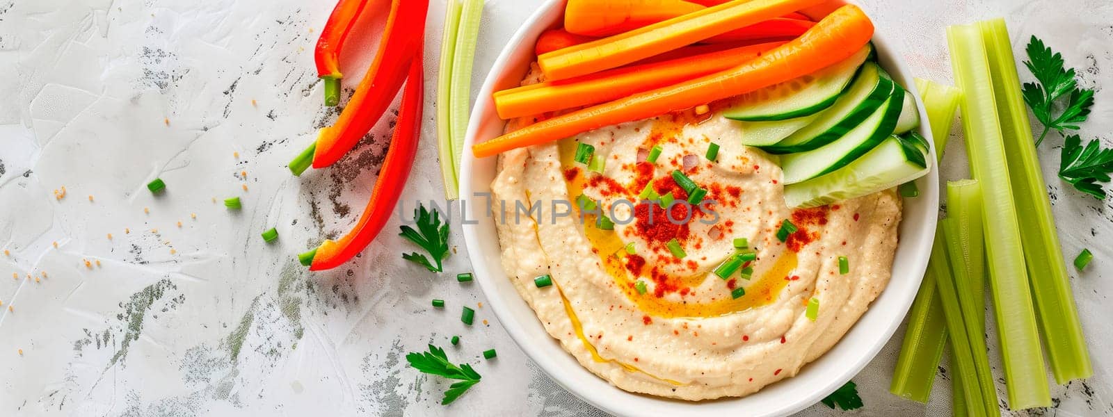 hummus with vegetables in a bowl. selective focus. by yanadjana