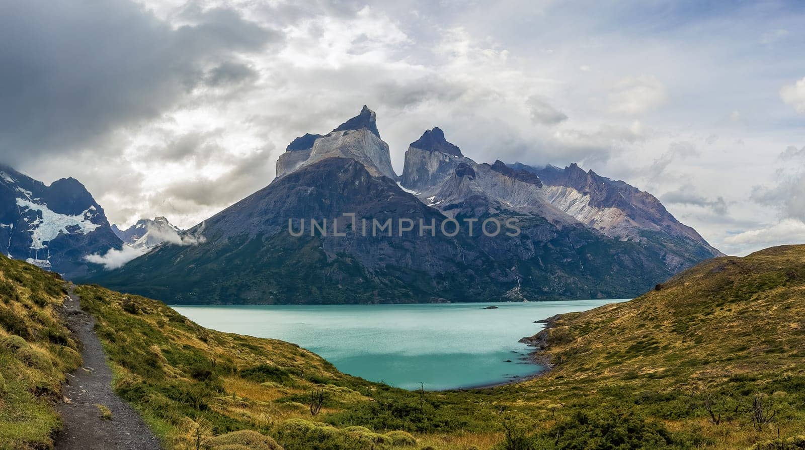 Majestic Peaks Overlooking a Serene Mountain Lake by FerradalFCG