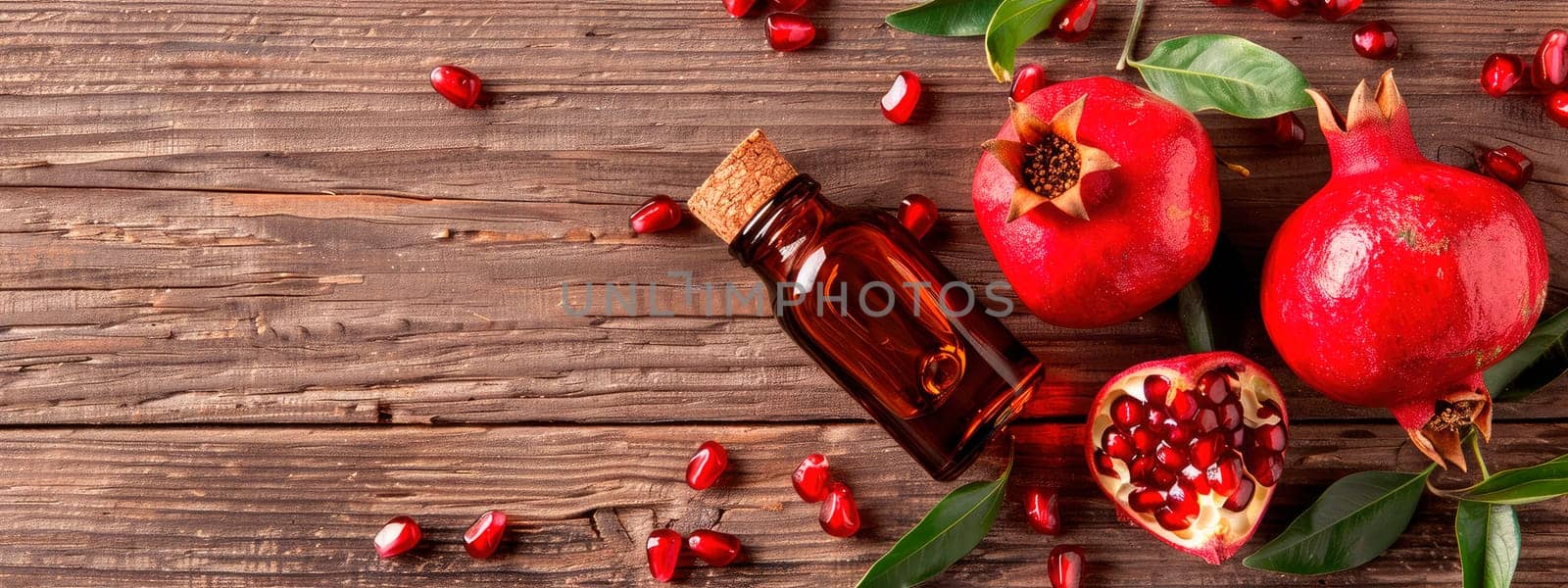 pomegranate essential oil in a bottle. selective focus. nature.