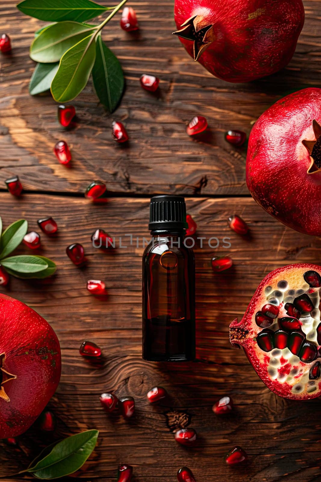 pomegranate essential oil in a bottle. selective focus. nature.