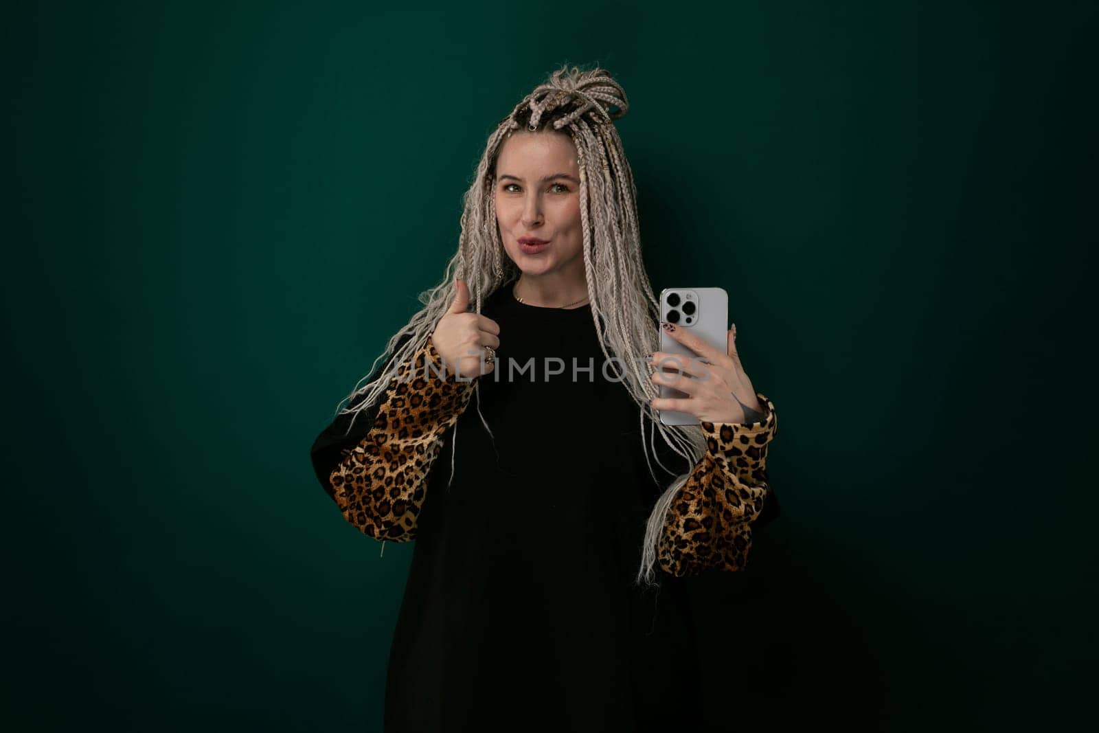 Woman With Long Hair Holding Cell Phone by TRMK