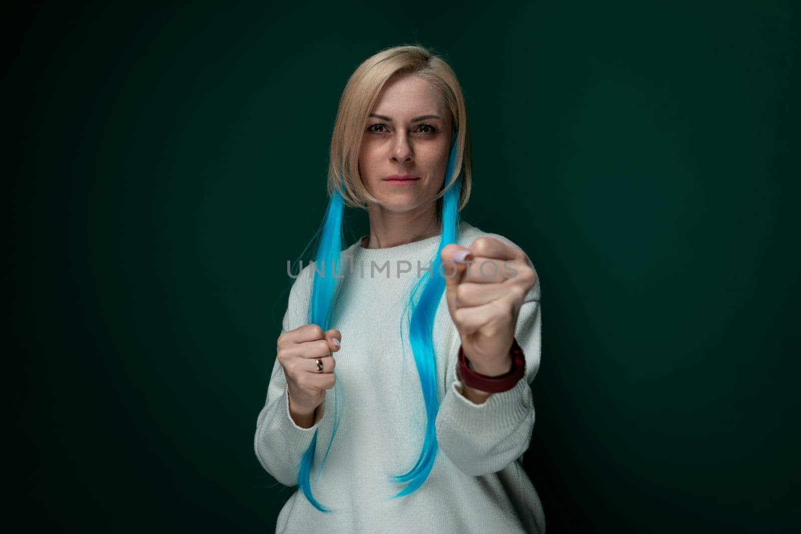 Woman With Long Blue Hair Holding a Pair of Scissors by TRMK