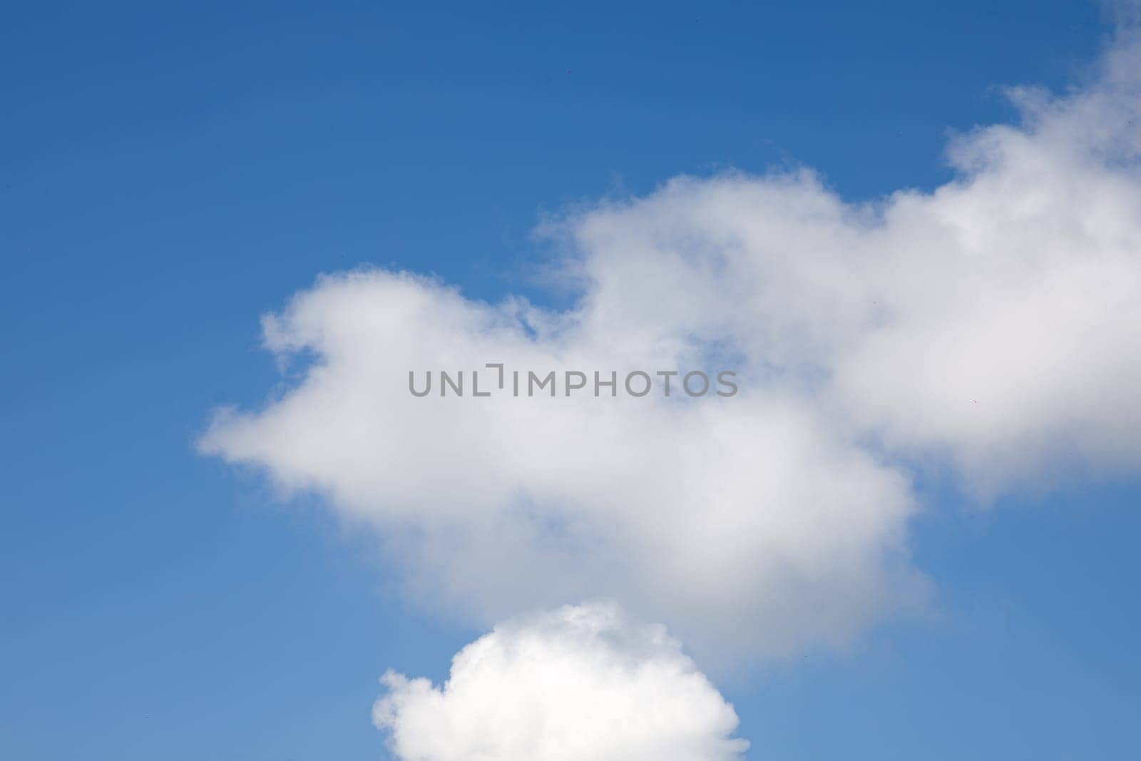 white clouds on the background of the blue sky by IvanDerkachphoto