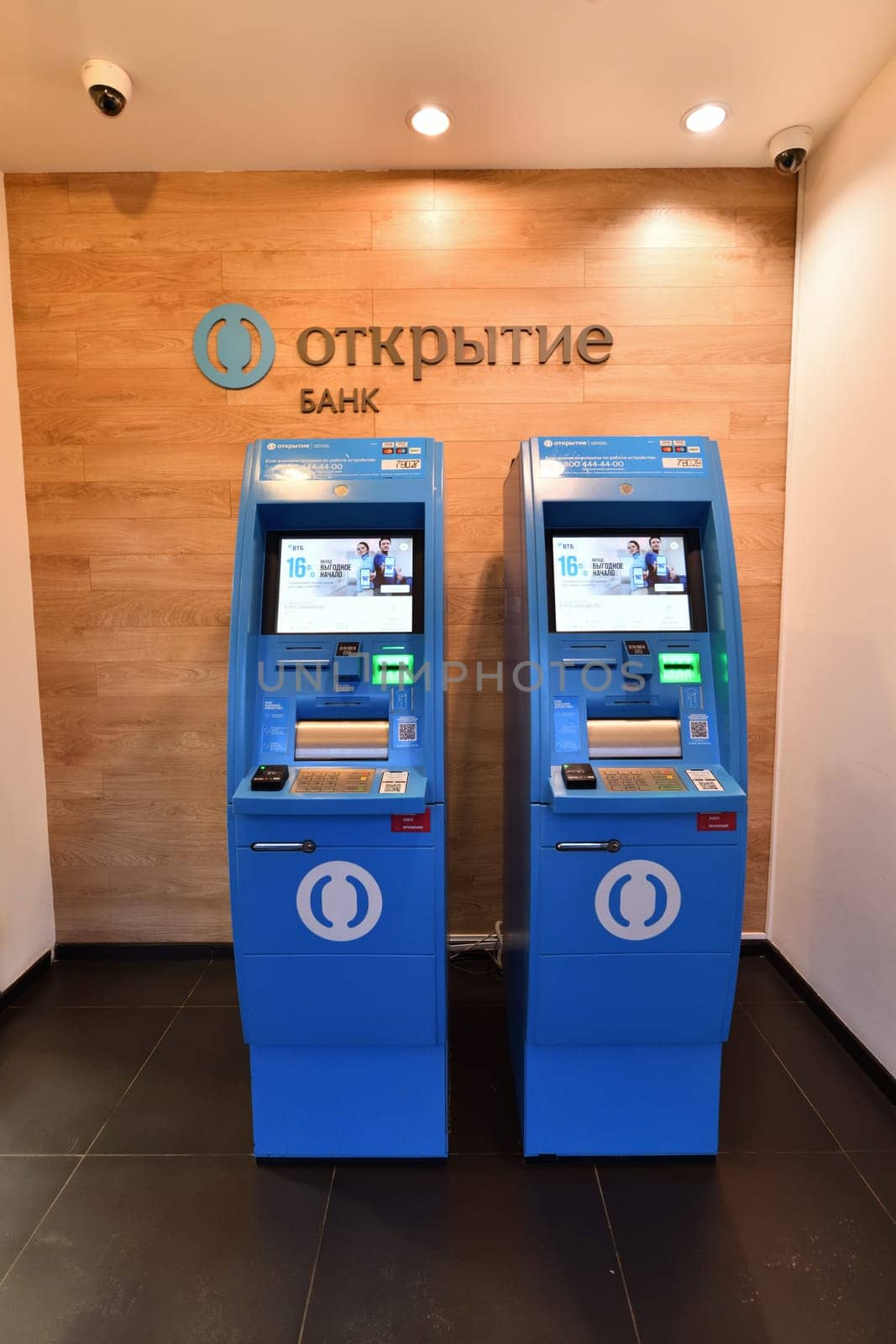 Moscow, Russia - 28 March 2024. ATMs Otkritie Bank indoors by olgavolodina